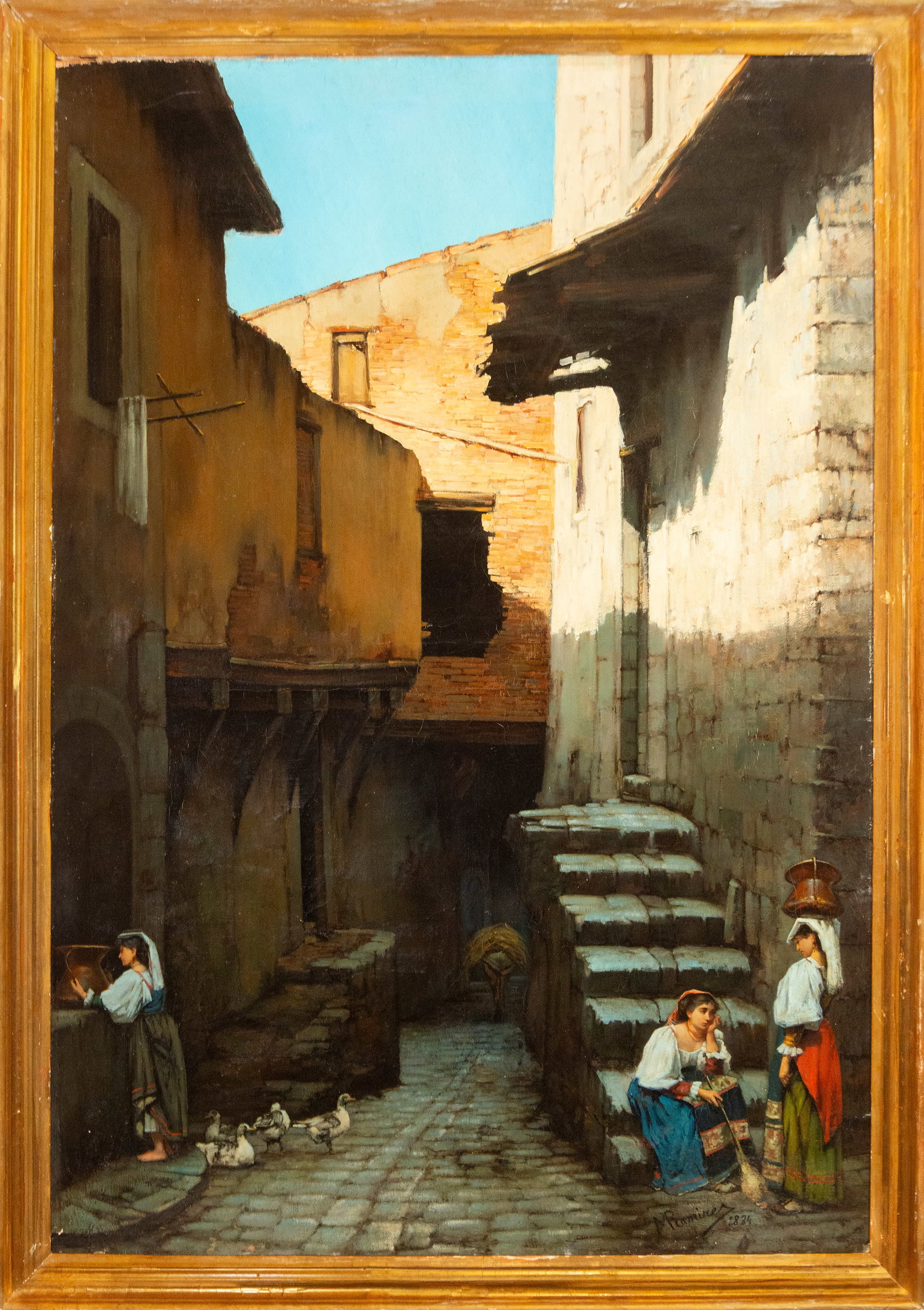 Manuel Ramírez e Ibáñez (1856-1925) Spanish School, 19th Century.: Oil on canvas. Dimensions: 123 cm x 88 cm and 135 cm x 98 cm (framed). A genre scene set in a narrow street with vernacular architecture, where several female figures dressed in traditional clothing g