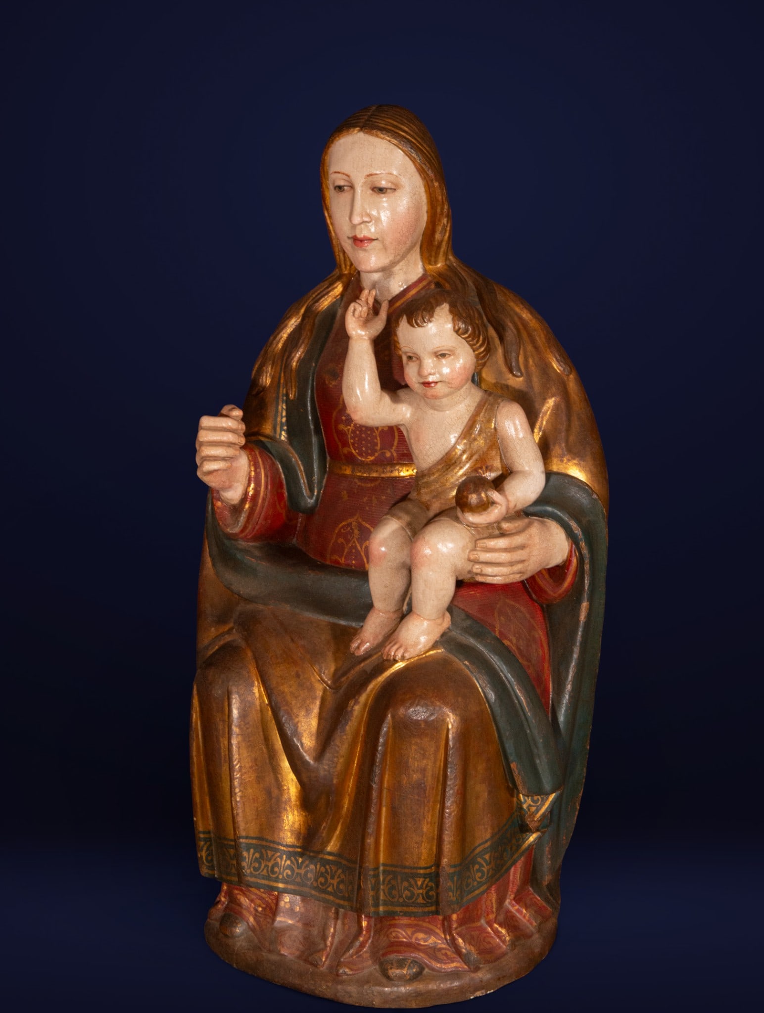 Large Italian Enthroned Madonna from the 16th century (polychromy restored in the 20th century): Carved and polychrome wood. Measures 80 x 34 x 30 cm.