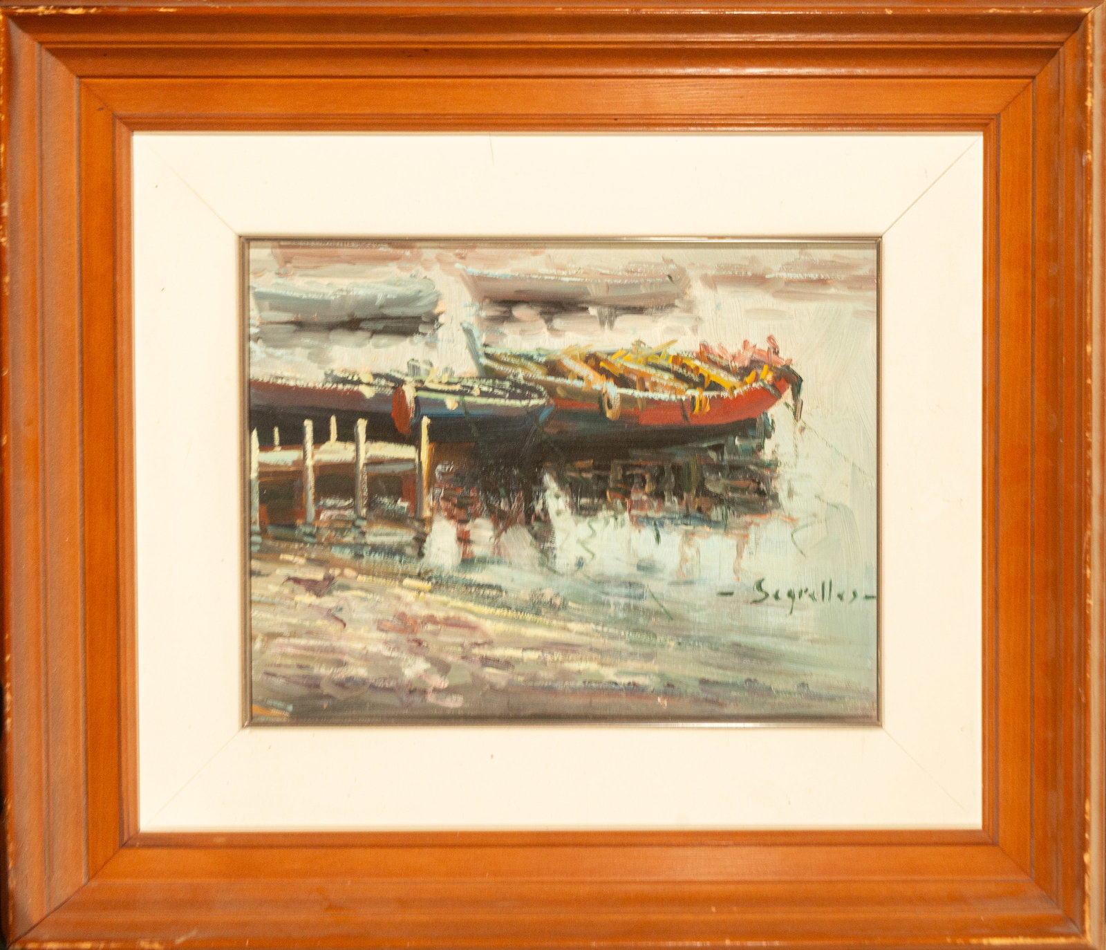 Antonio Segrelles. Spanish School. 20th Century.: Oil on canvas. Dimensions: 36 x 26 cm and 60 x 49 cm. A seascape featuring a boat beached next to a pier, rendered with impasto and gestural brushstrokes that construct the scene using chromatic plane