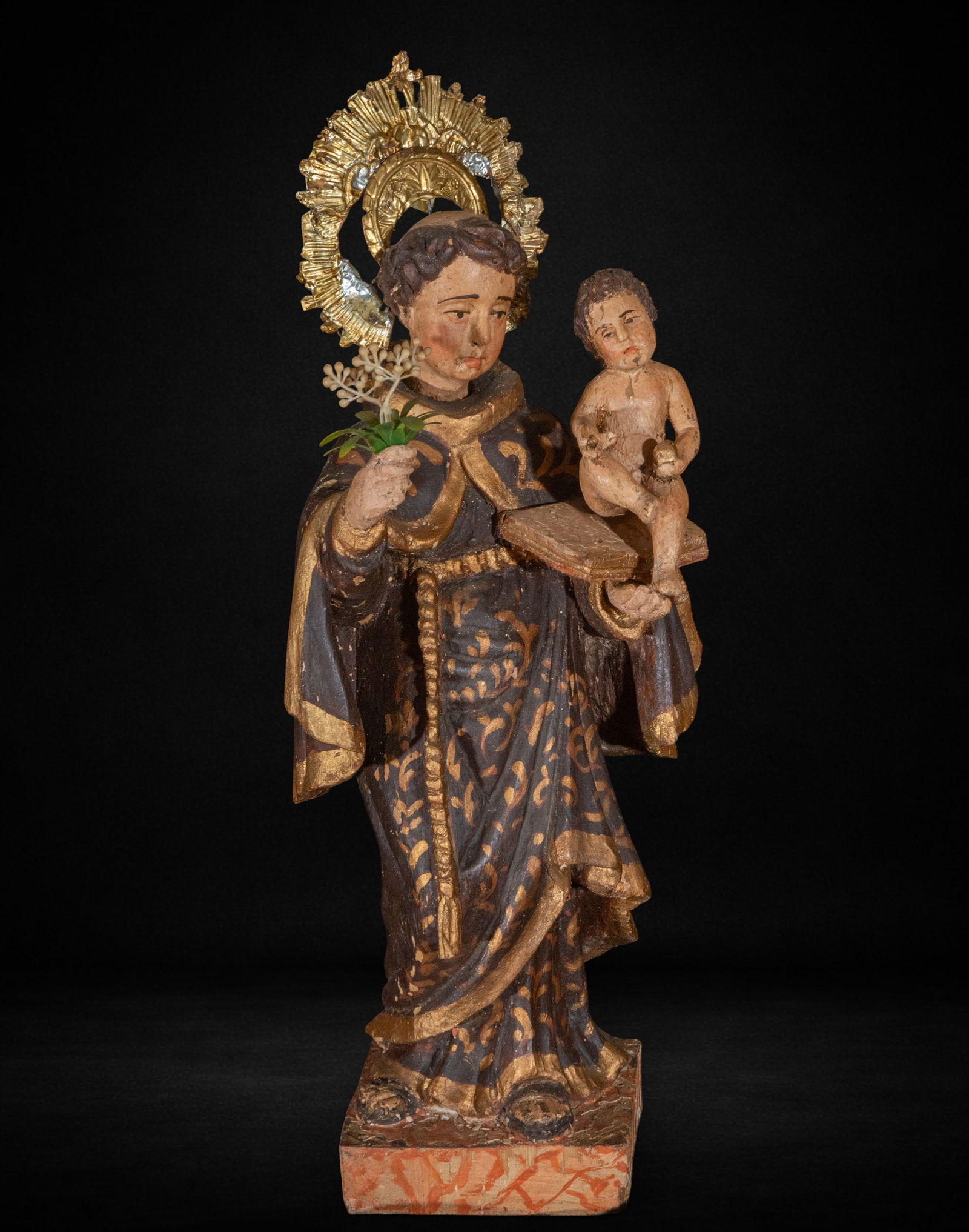 Saint Anthony with Child, Colonial, 18th Century: Carved and polychromed wood. Measures 42 x 15 x 11 cm. Saint Anthony with Child in colonial style, wearing a Franciscan habit and the Child on a support, dating from the 18th century.