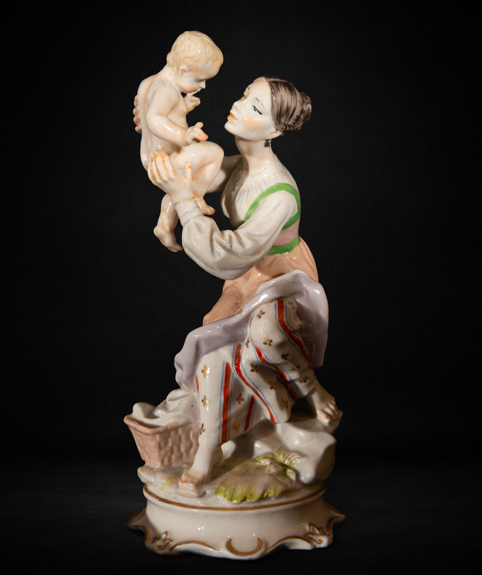 Porcelain group of woman with child in arms (1 of 3)