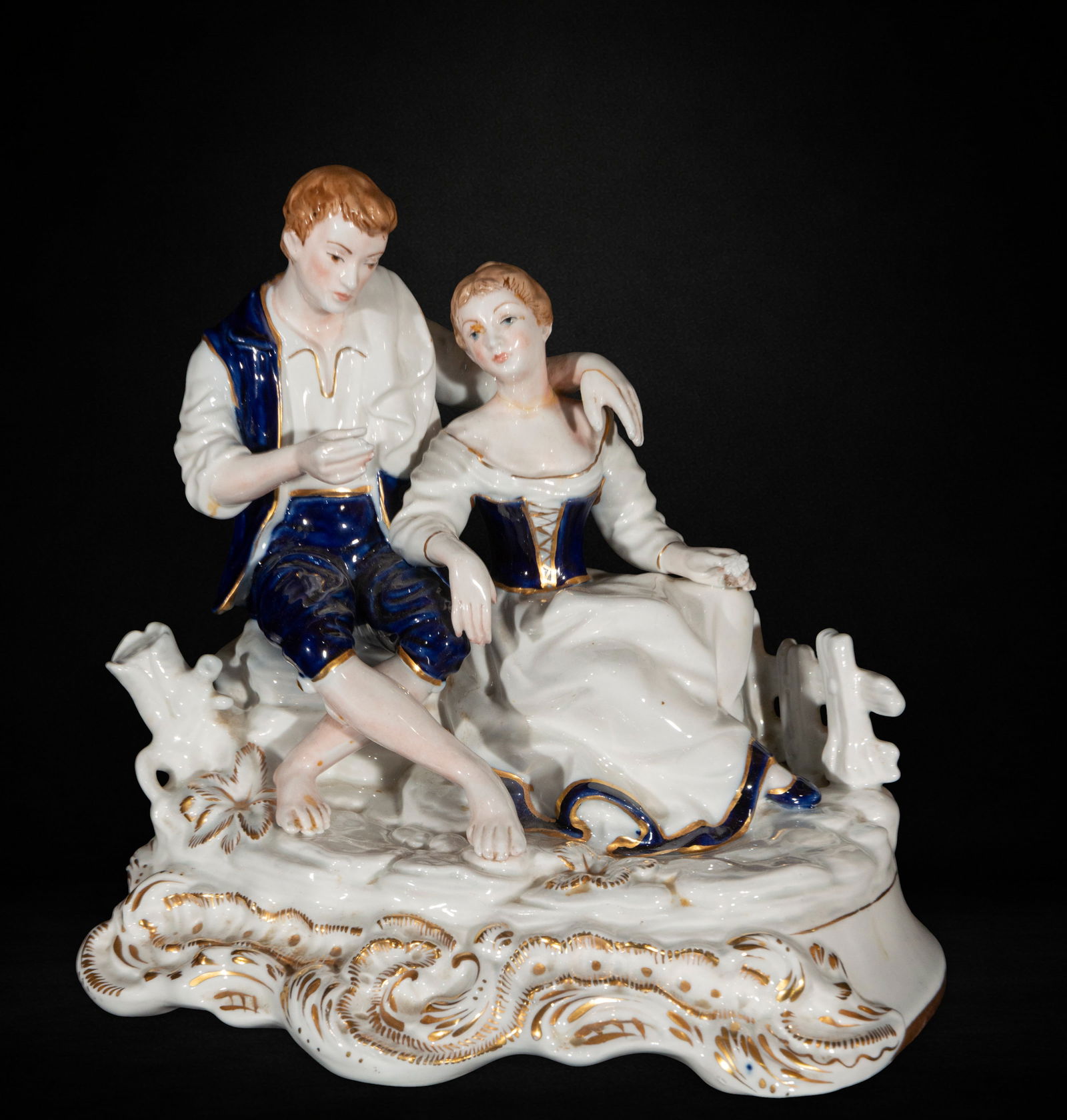 Porcelain couple in a gallant scene: Porcelain couple in a gallant scene, measures 18 cm x 29 cm x 19 cm