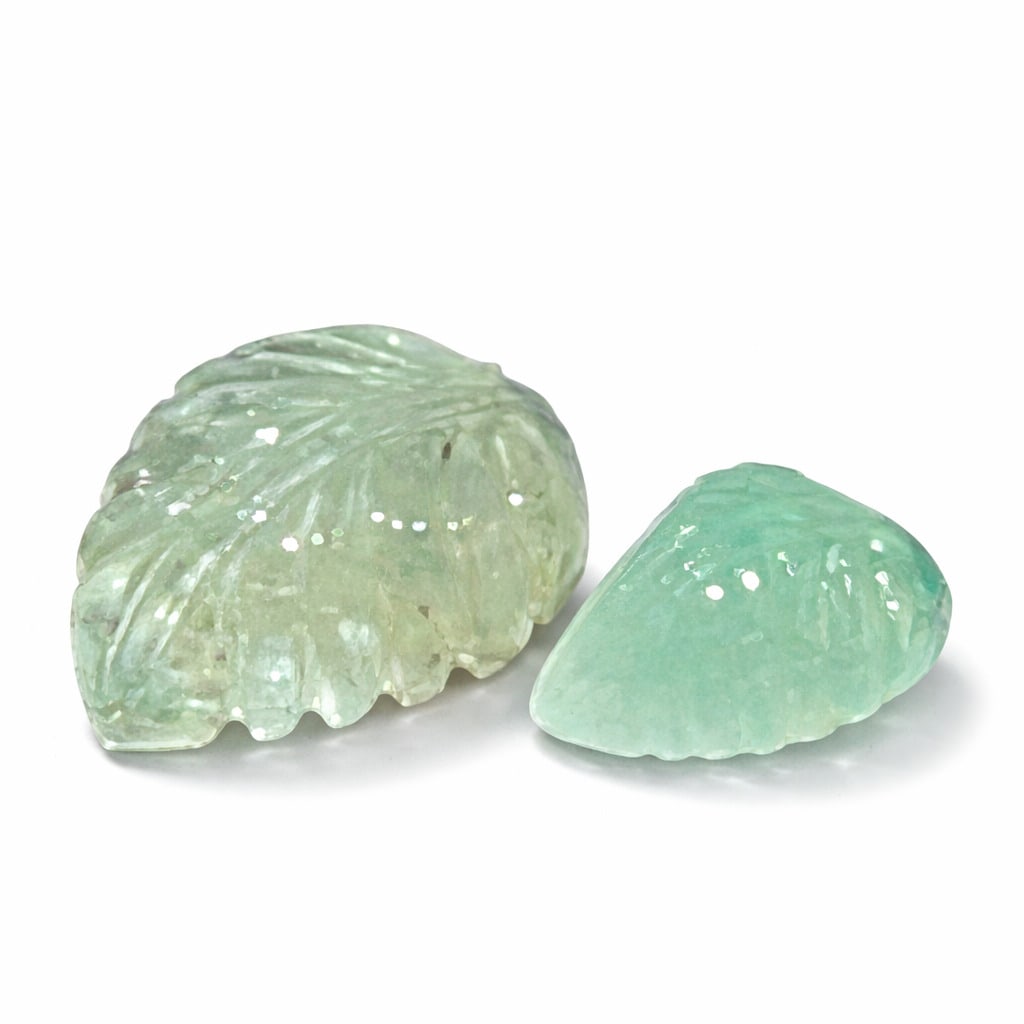 PAIR OF 12.25 CT LEAF CUT MUGHAL EMERALDS FROM INDIA: 12.25CT BOTH. PROVENANCE: STOCK OF A RETIRED JEWELER.