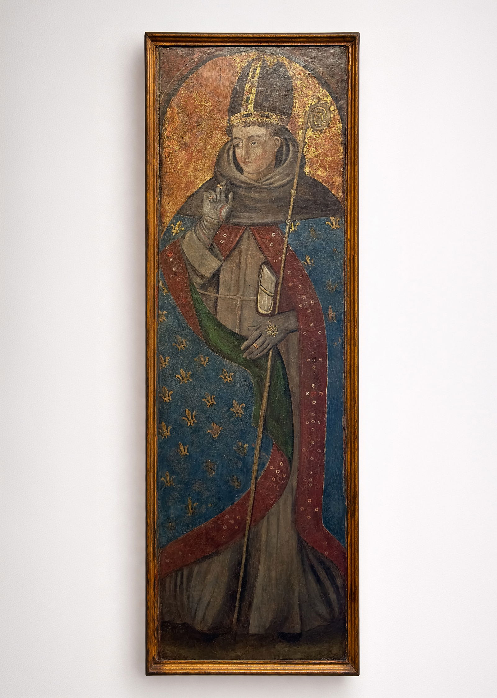 WORKSHOP OF THE VIVARINI (Venice, 15th–16th centuries) - Saint Louis of Tolosa (c.1500): Tempera and gold on panel. Dimensions: 126 x 39 cm. The work depicts Saint Louis of Toulouse vested in all episcopal regalia, mitre and crosier, while raising his gloved left hand in a gesture of bles