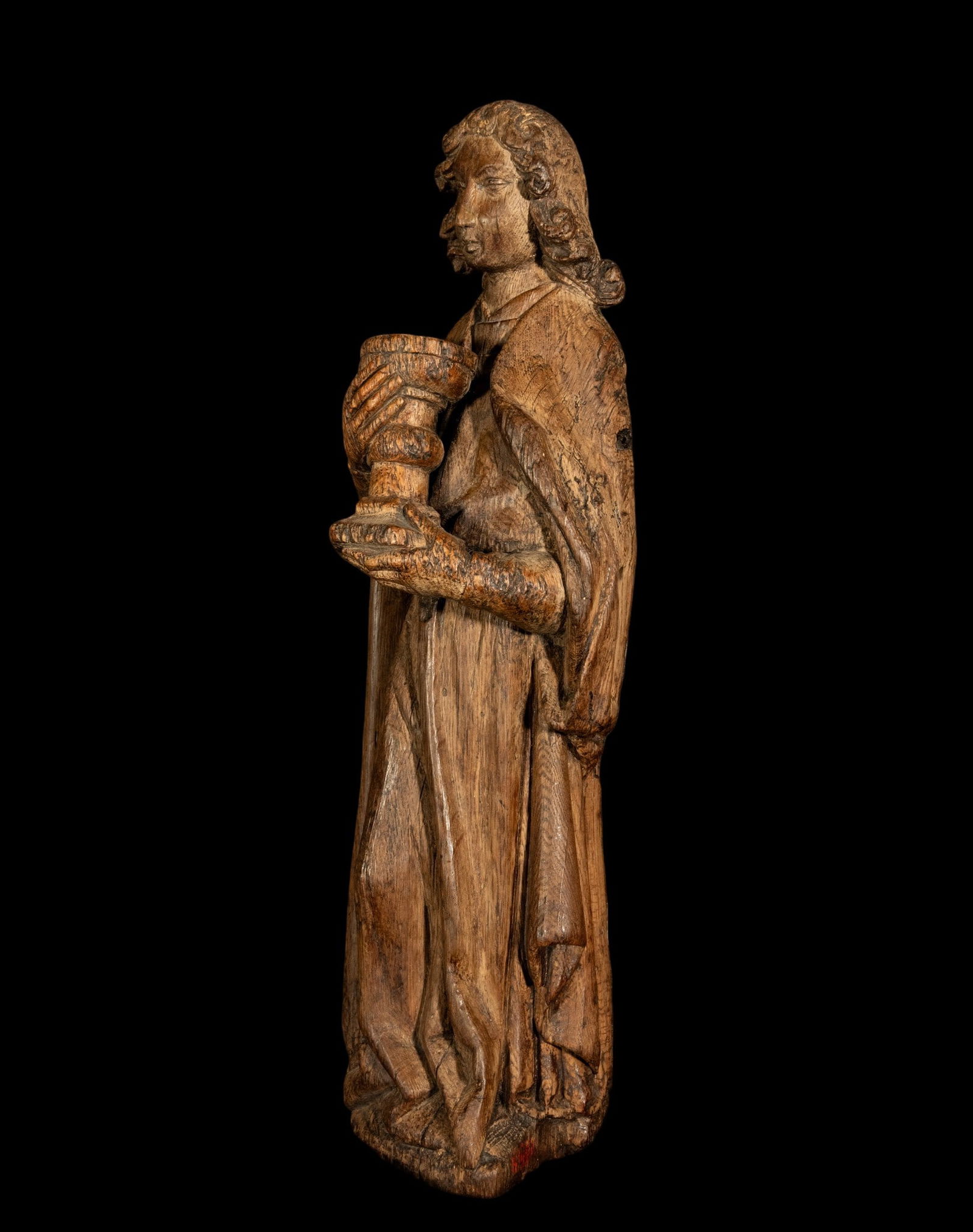 Guardian Angel, possibly Flemish Gothic, in oak: Measurements: 46 x 10 x 13 cm. Provenance: important private collection.