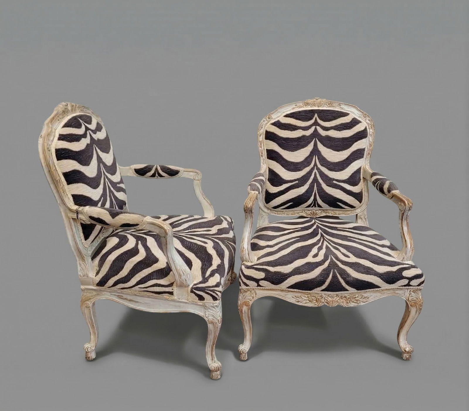 PAIR OF ARMCHAIRS, CARVED AND POLYCHROME WOOD, ZEBRA-PRINTED UPHOLSTERY, LOUIS XV, CIRCA 1790 –: Style: Louis XV. Material: Carved and polychrome wood. Period: Late 18th century, circa 1790. Country of origin: France. Good condition for its age and use. Dimensions: 96 x 60 x 70 cm. Seat height: 4
