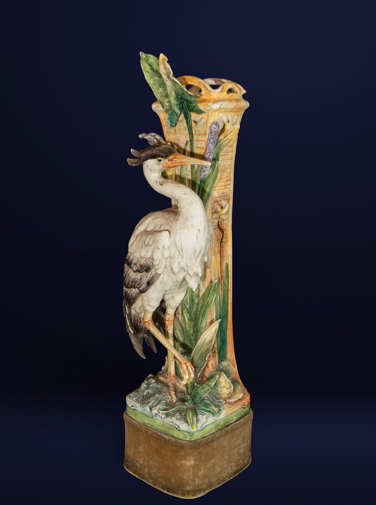 Heron with reeds, possibly French ceramic, 20th century: Polychrome glazed ceramic. Measurements 100 x 30 x 23 cm.