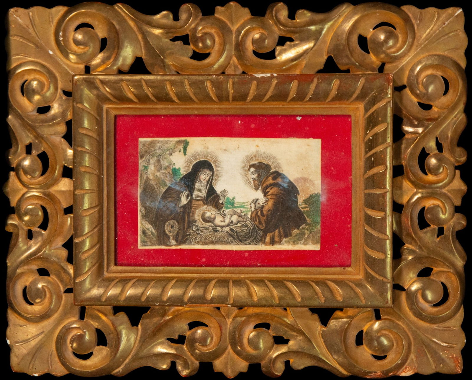 Adoration of the Child with Saint Anthony and the Virgin, Devotional engraving, 18th century: Colored devotional engraving of the Virgin Mary and Saint Anthony adoring the Christ Child, highlighted by radiant halos and delicate hand-coloring. 17th–18th century taste. Plate: 14 × 9 cm; frame