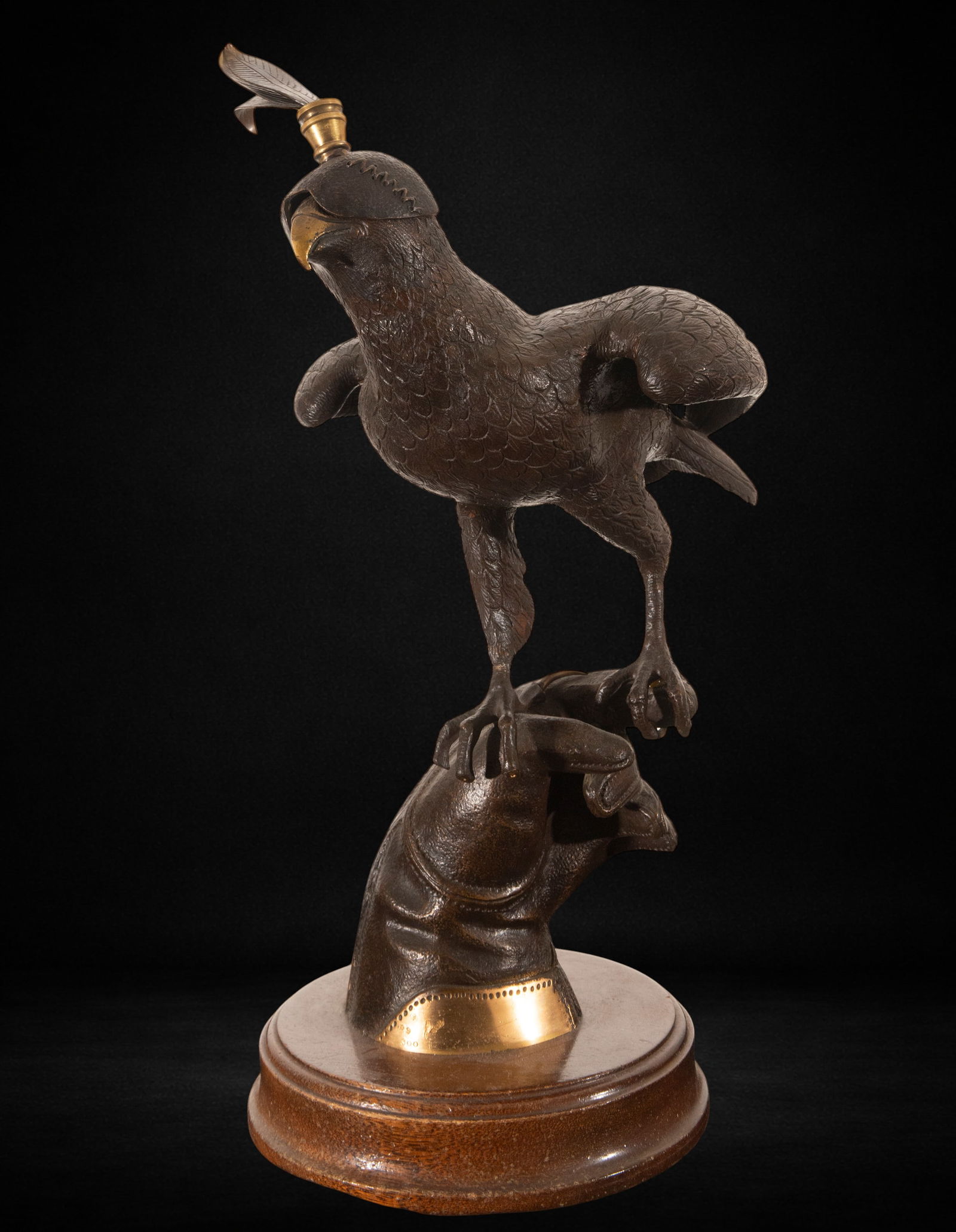 Ricardo Soriano - Important Bronze Sculpture of a Falcon for Falconry 29/300: Patinated bronze sculpture with gilt details. Measures 44 x 28 x 35 cm. Figure of a bird perched on a falconry glove, with a small cap topped with a feather and gilt metallic details that emphasize it