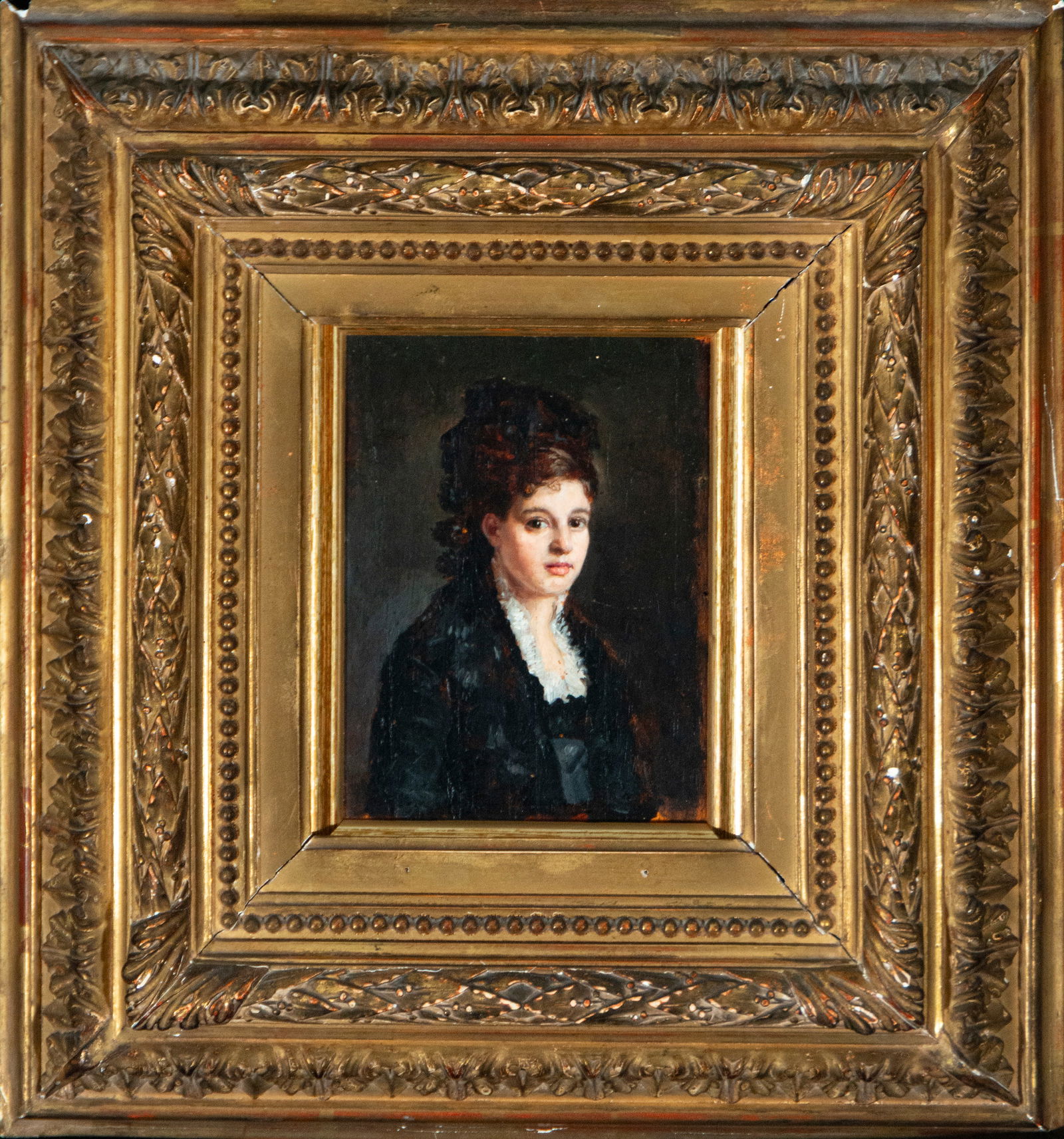 Portrait of a lady, attributed to Raimundo de Madrazo, Spanish School, 19th Century: Oil on panel. Dimensions 44 x 16.5 / 30 x 32 cm. Small bust portrait of a woman, her figure silhouetted against a dark background and dressed in black with a light ruff, in an image of great sobriety