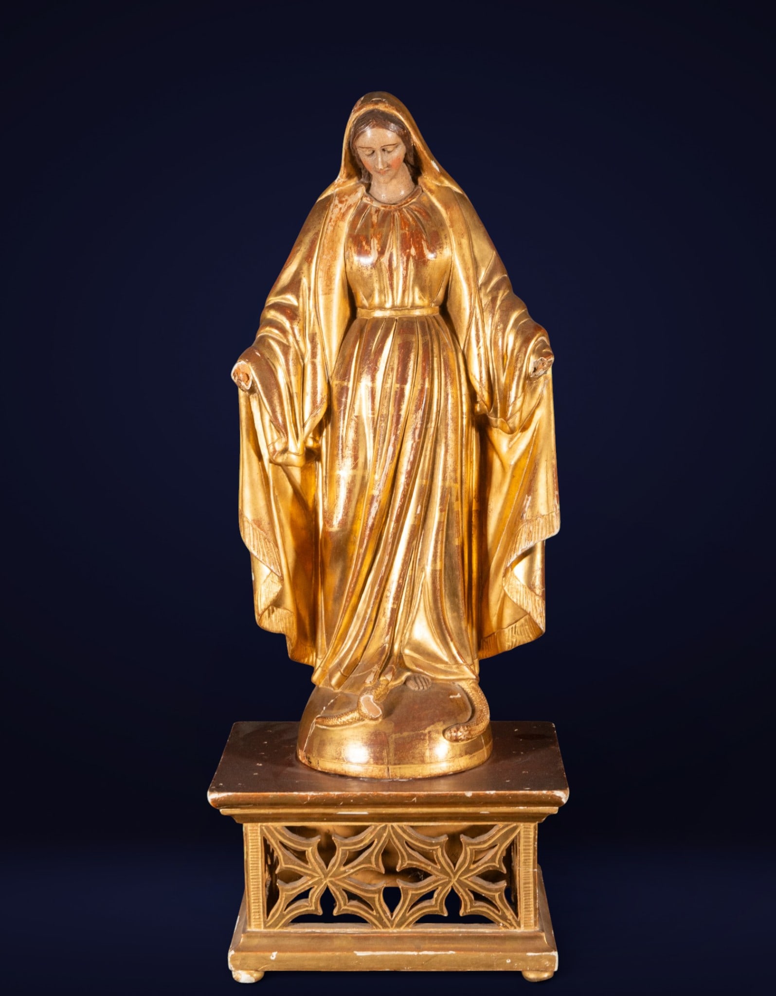 Miraculous Virgin, Spanish or Italian school, 19th century: Plaster sculpture or molded composition, probably gilded and polychromed. Measures 58 x 30 x 18 / 76 x 30 x 22 cm.