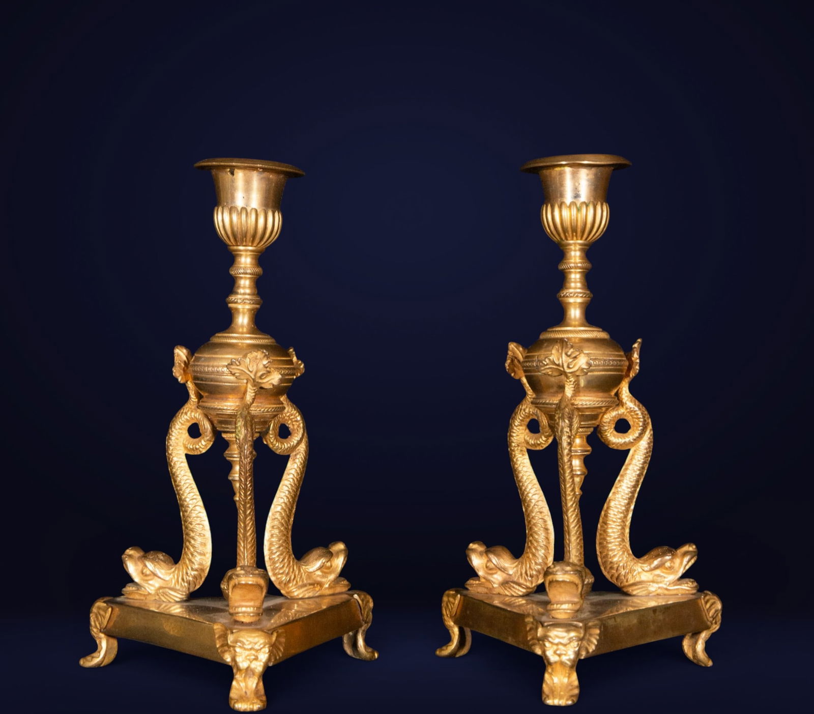 Pair of Empire style candlesticks, Thomire style, 19th century: Ormolu. Measurements 20 x 12 x 12 cm.