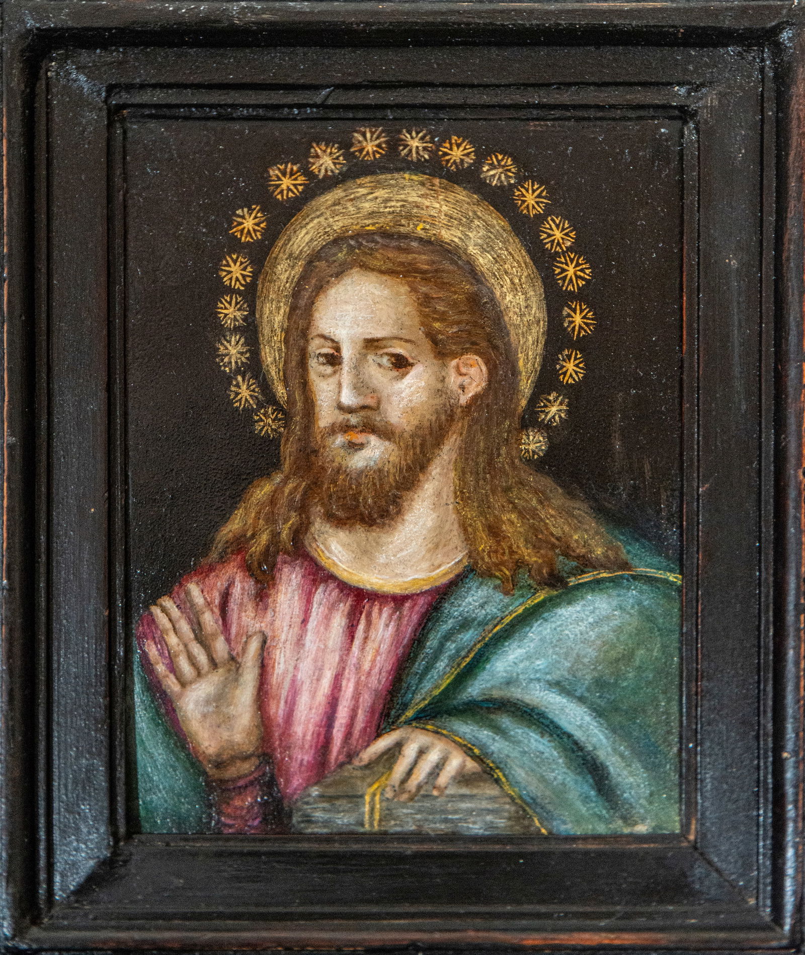 Salvador. Colonial school. 18th century: Oil on copper. Dimensions 14 x 12 / 20 x 16 cm. Small devotional painting depicting Christ the Savior in bust form, with a golden halo of starlight, a serene gesture of blessing, and a frontal pose im