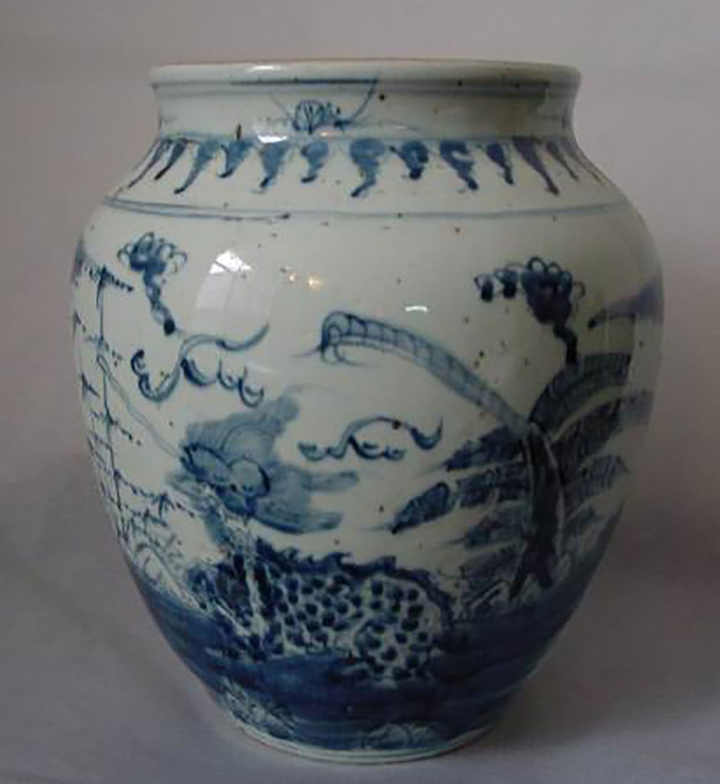 White porcelain vase decorated on a cobalt blue cover with qilin chimeras in a grove. China, Qing (1 of 2)