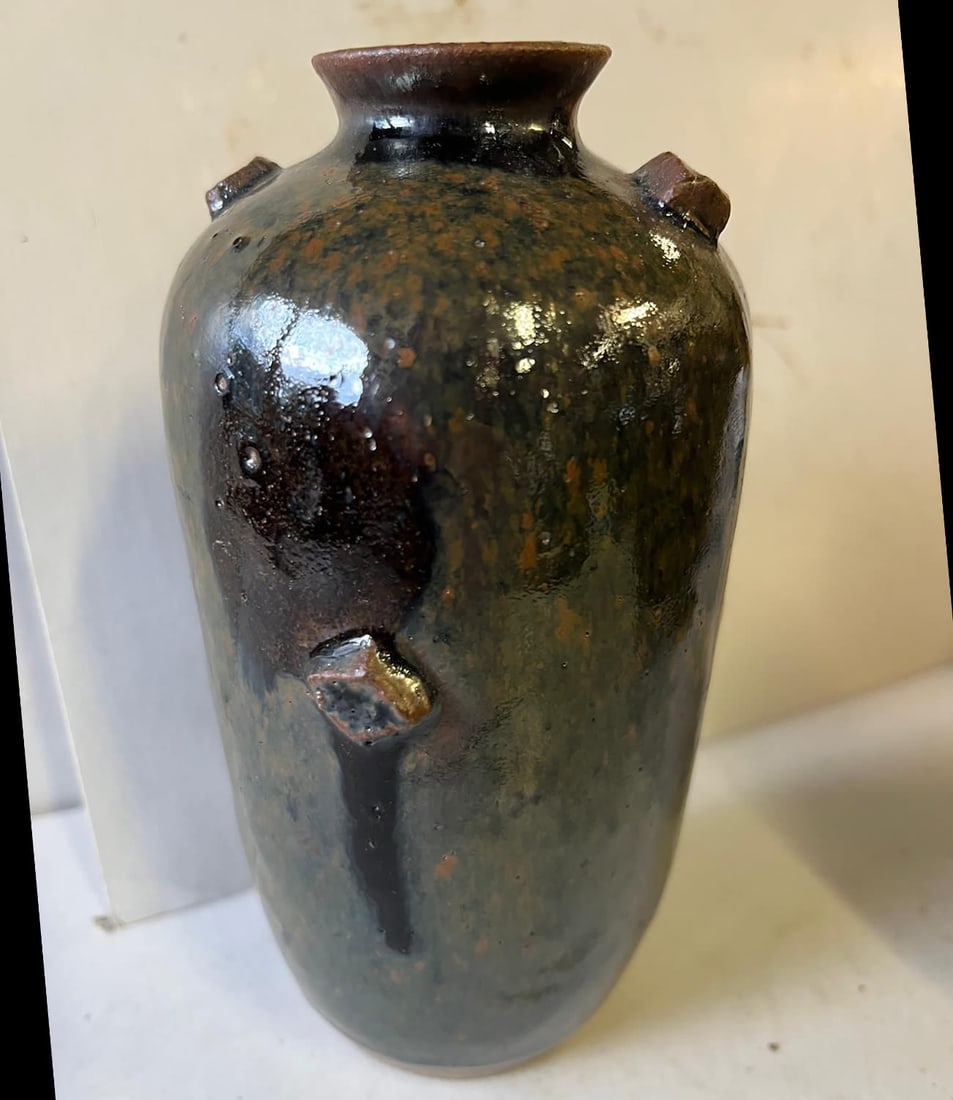 Small ovoid vase with a small flared neck in fine sandstone with a monochrome black glaze shaded (1 of 12)