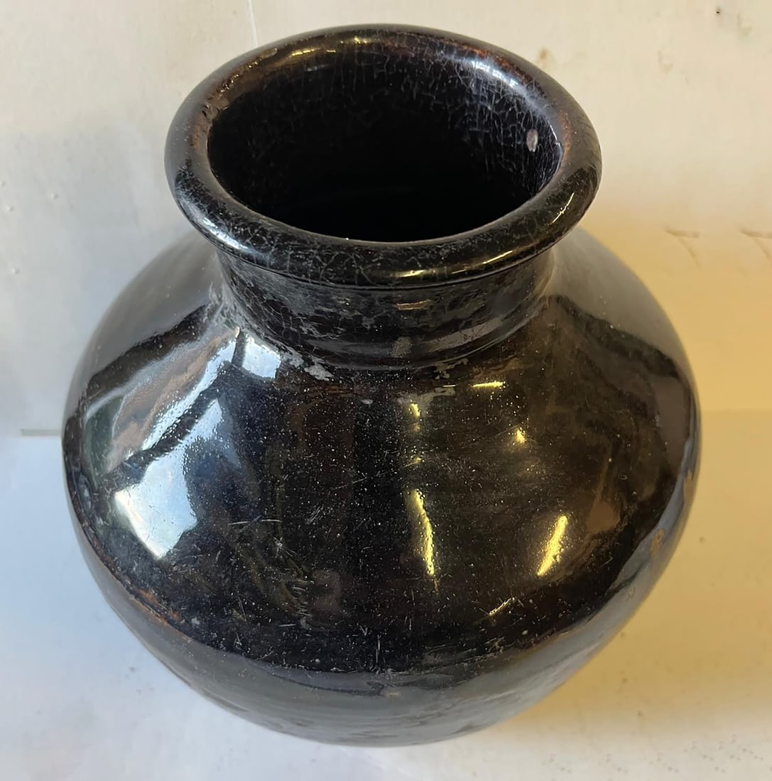 Thick stoneware jar with a monochrome black glaze. China, Ming Dynasty 1368–1644. Height 23 cm x (1 of 8)