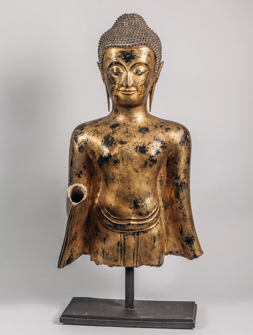 Bust of Buddha, who is said to be in the Abaya mudra position, hands facing forward, wearing a (1 of 2)