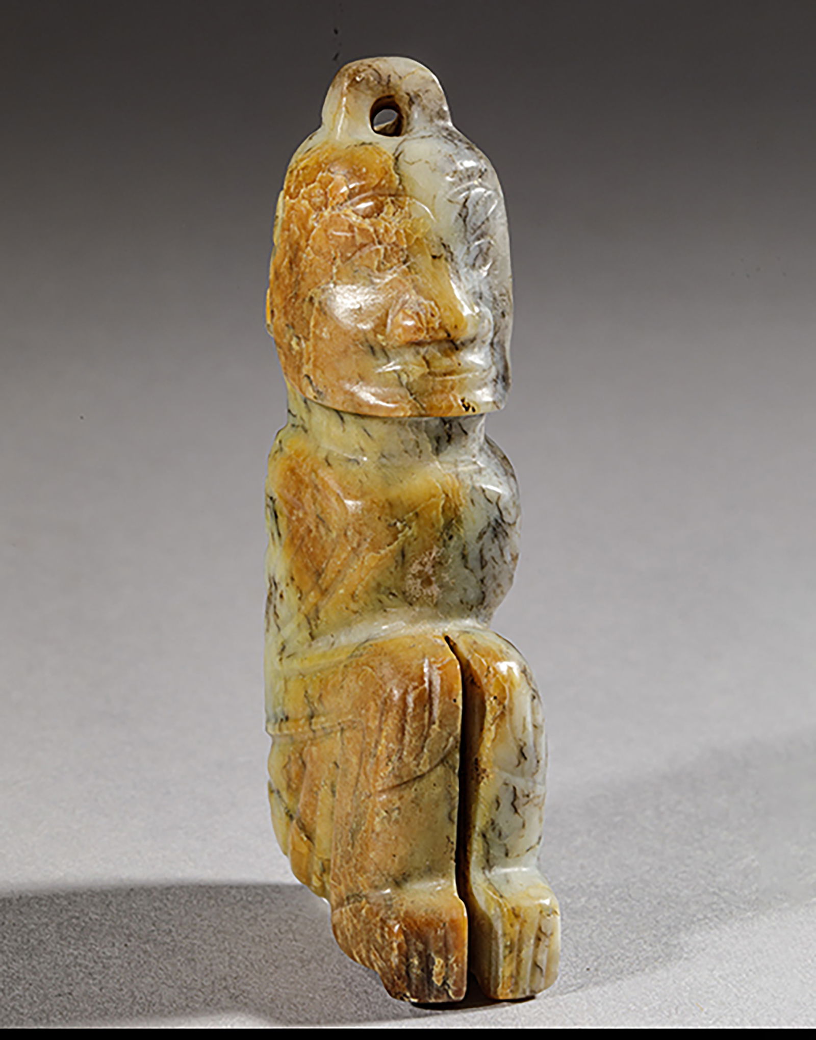 Character in mottled green jade tinged with ochre. China, Western Zhou Dynasty - 11th to 7th century (1 of 4)