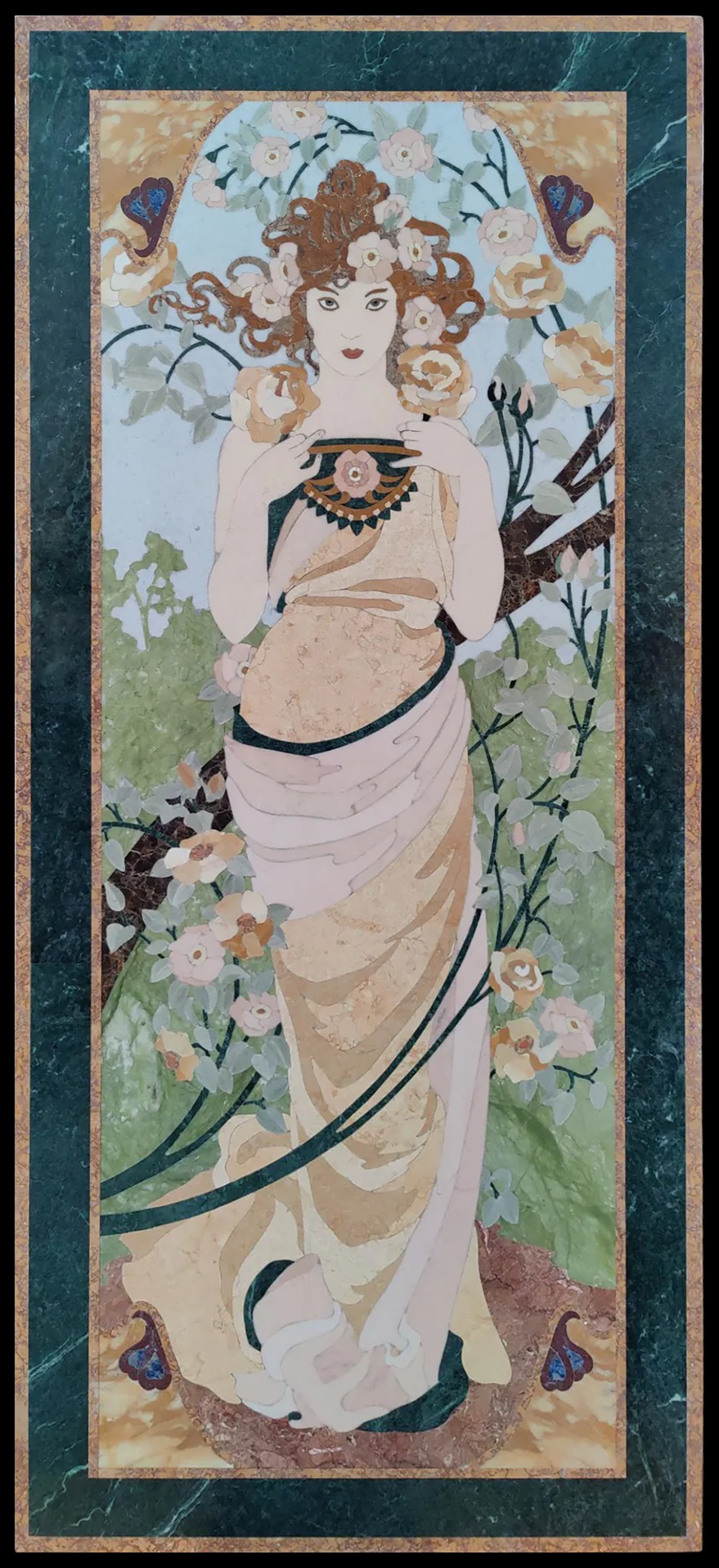 Marble panel following designs by Alfons Mucha (1860-1939), Italy, 20th century: Polychrome marble inlaid on a travertine base. Dimensions: 179.5 × 80.5 × 3 cm. A refined panel depicting a woman in elegant attire surrounded by floral motifs. The intarsia is of excellent quality,