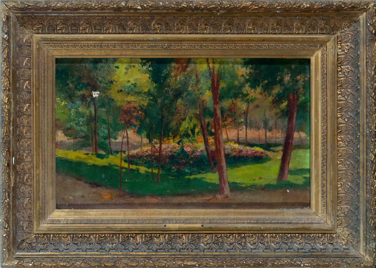 View of the park. Catalan School. 19th century: Oil on canvas. Dimensions: 36.5 x 27.5 cm. The painting depicts a serene scene of a wooded park, bathed in diffused light that penetrates the treetops and creates patches of color on the ground. The t