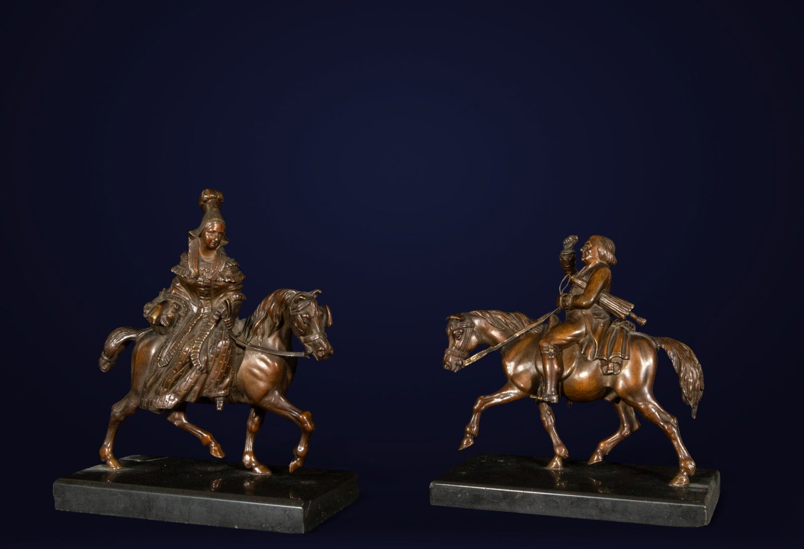 Pair of horses with rider and amazon, Central Europe, 19th Century: Bronze and black marble. Dimensions: 18 × 18 × 10 cm (rider) and 20 × 18 × 10 cm (horsewoman). Small-format equestrian sculptures depicting a pair of mounted knights, a horsewoman and a rider, bot