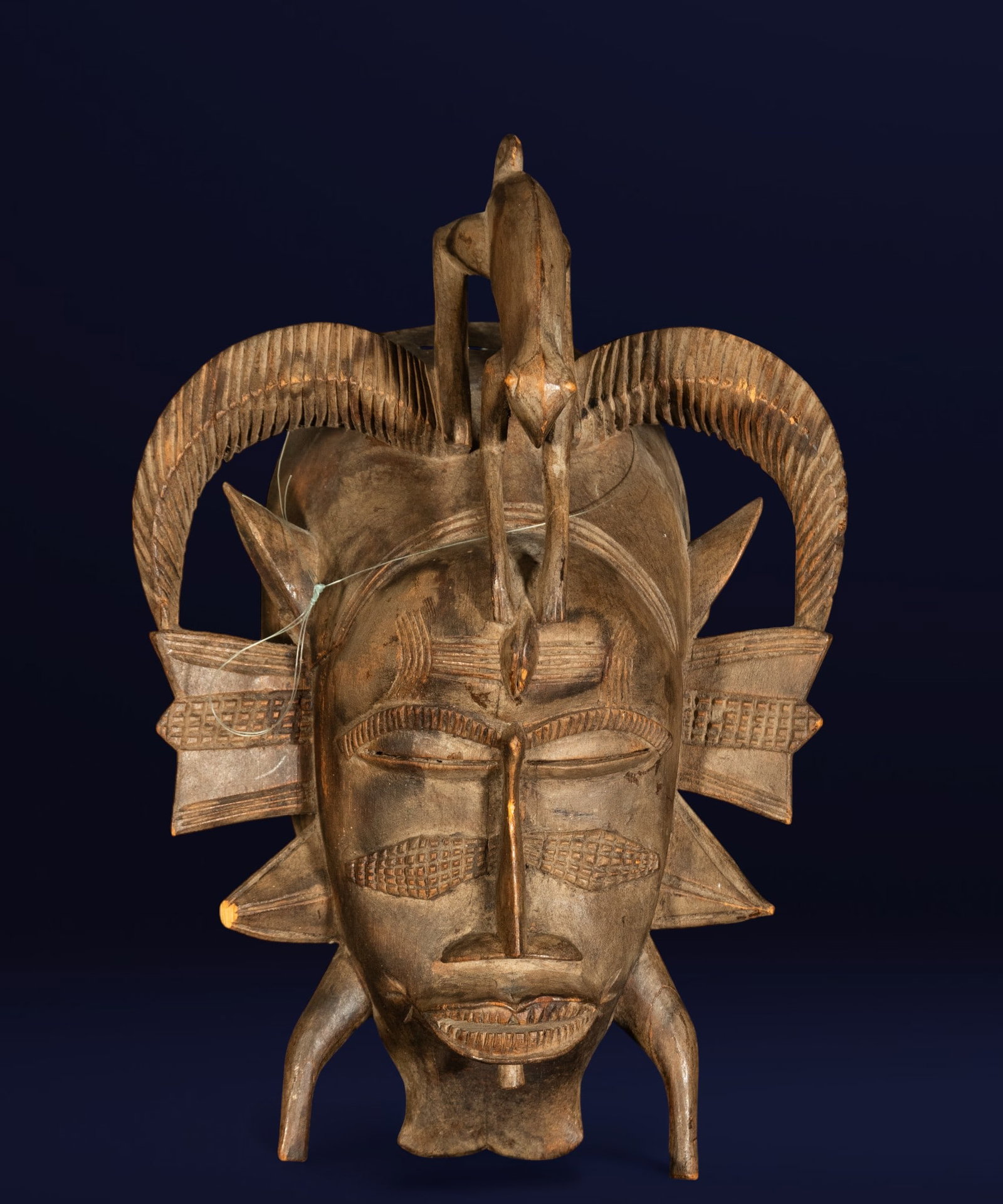 African Ivory Coast mask, 20th century: 27 x 23 cm