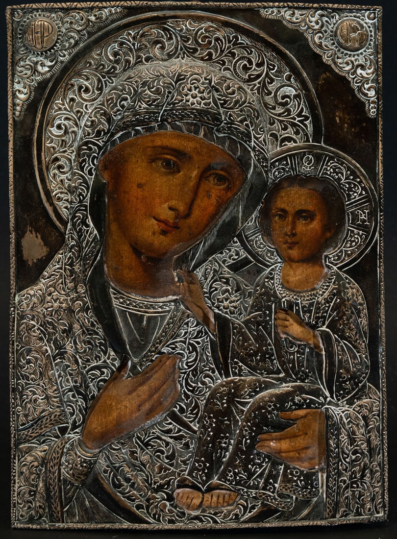 Important Orthodox Icon of Virgin and Child, 17th - 18th centuries: Embossed in Silver, measures 32 x 21 cm