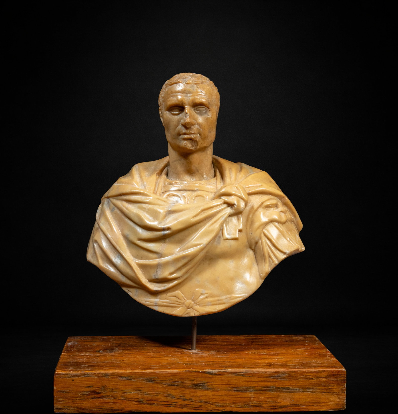 Decorative Neoclassical bust of Emperor Vespasian, 16 th C the head, the Robes 19th C: Carved and polished marble. Measurements 15 x 12 cm. Male bust inspired by classical models, conceived in the manner of Roman imperial portraiture, with the torso truncated at chest level and original