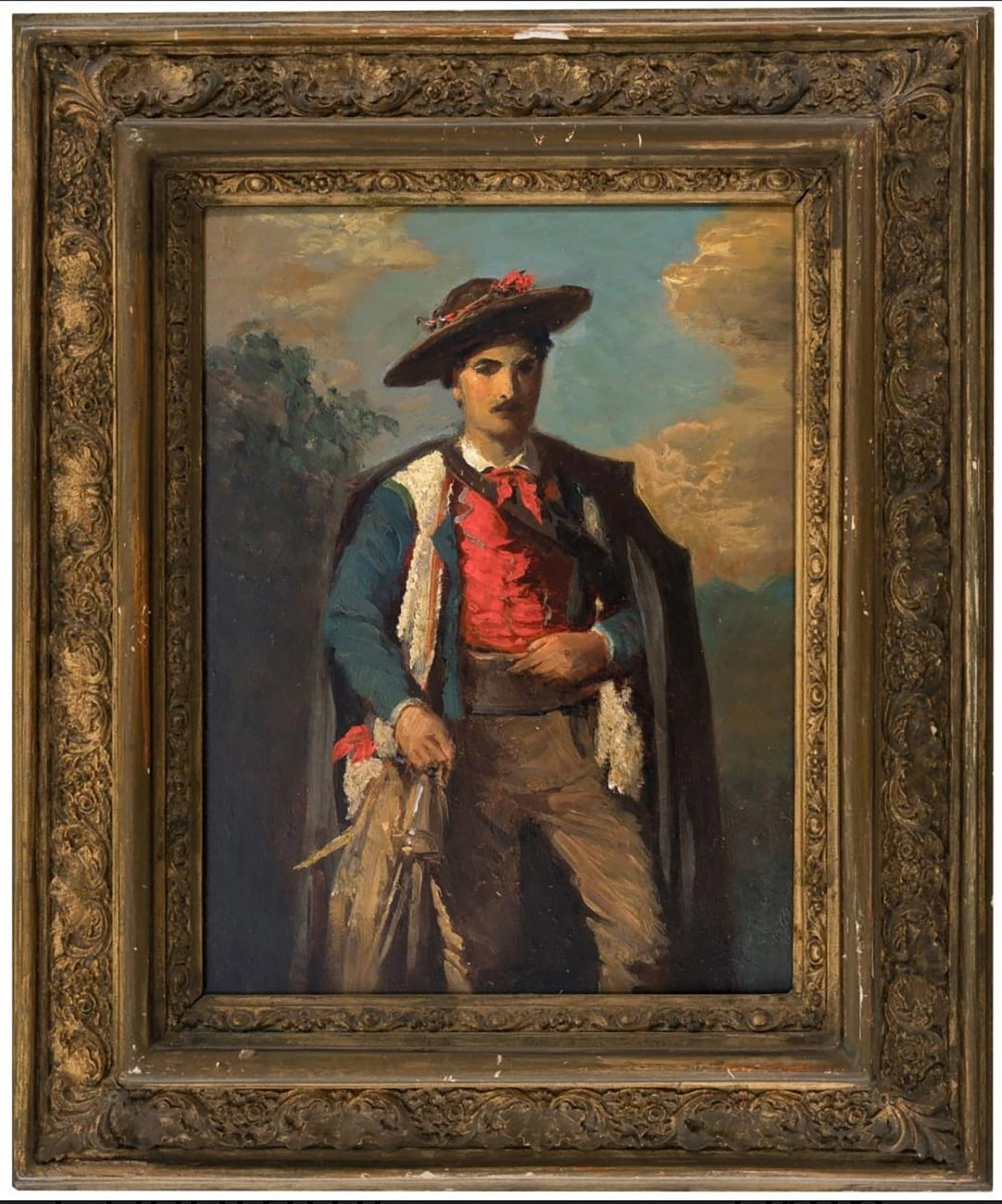 Italian brigand. Italian School. 19th century.: Oil on cardboard. Dimensions 30 x 27 cm. This painting depicts an Italian brigand standing at attention, dressed in a striking traditional costume consisting of a red waistcoat, blue jacket, and dark