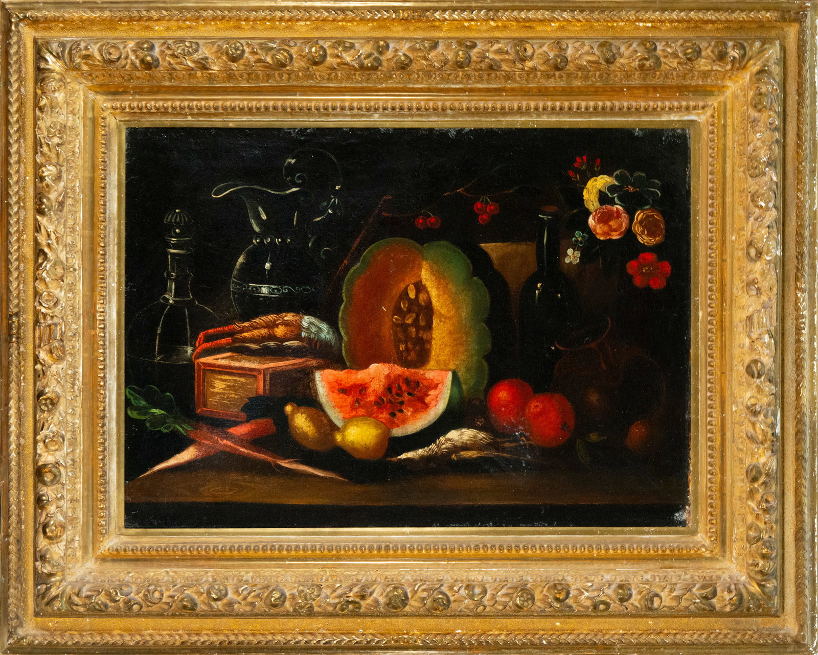 Still life of fruit. Spanish School. 19th century: Oil on canvas. Dimensions: 80 x 35 cm, framed 144 x 90 cm. This painting presents a classic still life composition grouping seasonal fruits—such as watermelon, melon, lemons, and tomatoes—along wi