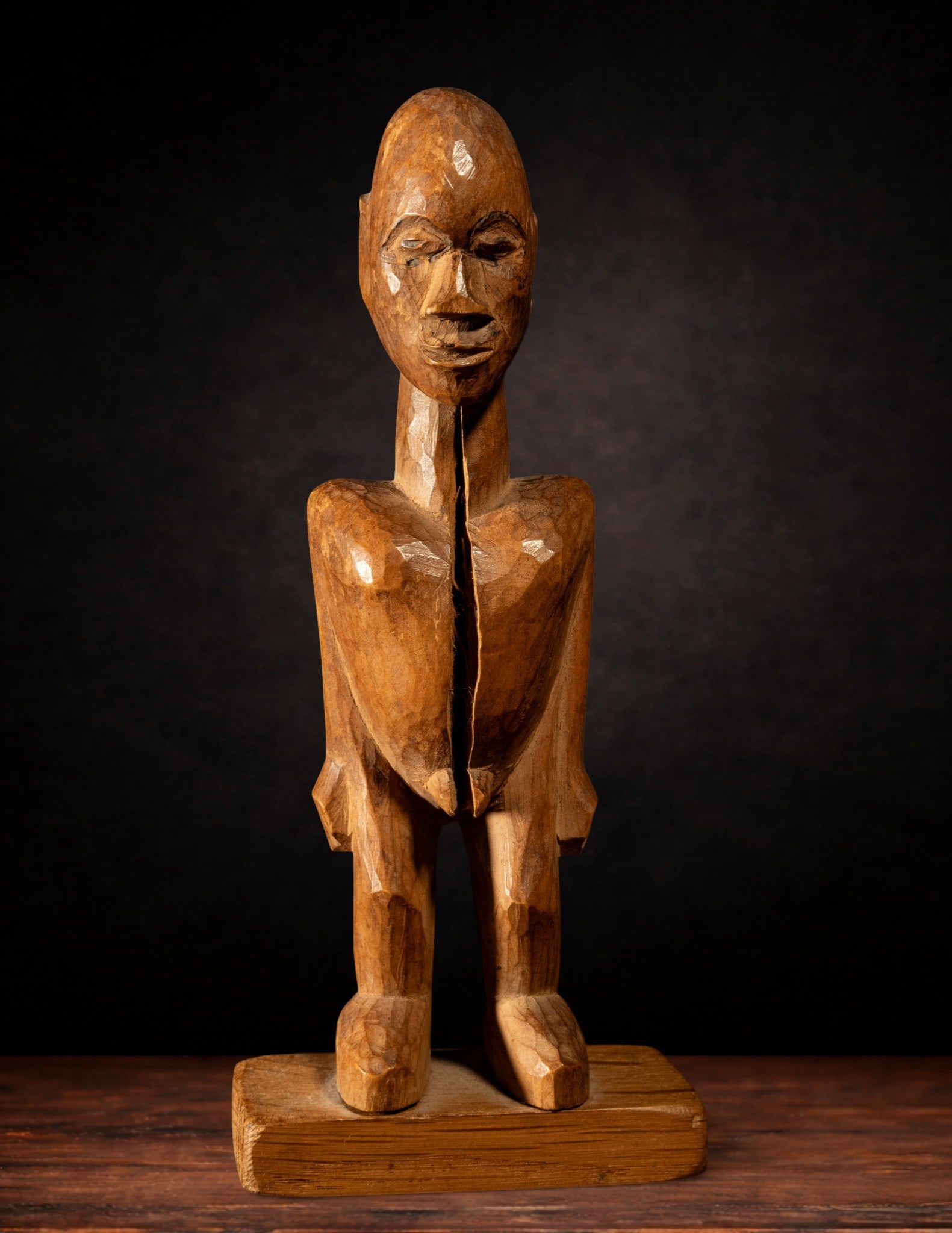 Lobi Fetish - Burkina Faso - African Art - Mid-20th Century: Period/Year - Mid-20th century. Materials: Wood. Size: 19.5 x 6 x 5 cm. Size Details: With base: 22 cm high