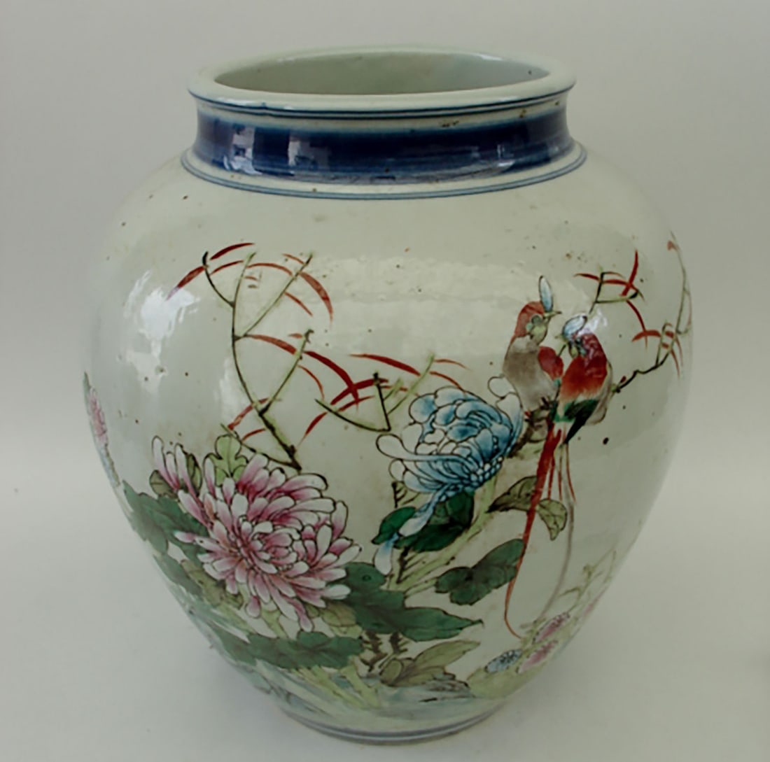 Famille Rose porcelain flowerpot decorated with polychrome enamels on the lid with a pair of birds: Famille Rose porcelain flowerpot decorated with polychrome enamels on the cover with a pair of birds perched on a branch and a calligraphy poem. China Qing Dynasty. 19th century. Height 28 cm. Diamete