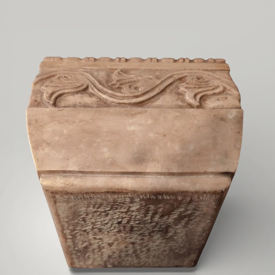 Marble mortar/vaso with Art Nouveau style decoration, Italy, 20th century: Carved marble. Dimensions: 25 × 25 × 21 cm. A unique, square-shaped marble vase or mortar with relief decoration on all sides, featuring vegetal scrolls clearly reminiscent of the Art Nouveau style.