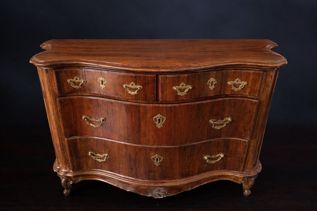 Venetian walnut chest of drawers with a sloping front, Italy, 18th century (1 of 3)