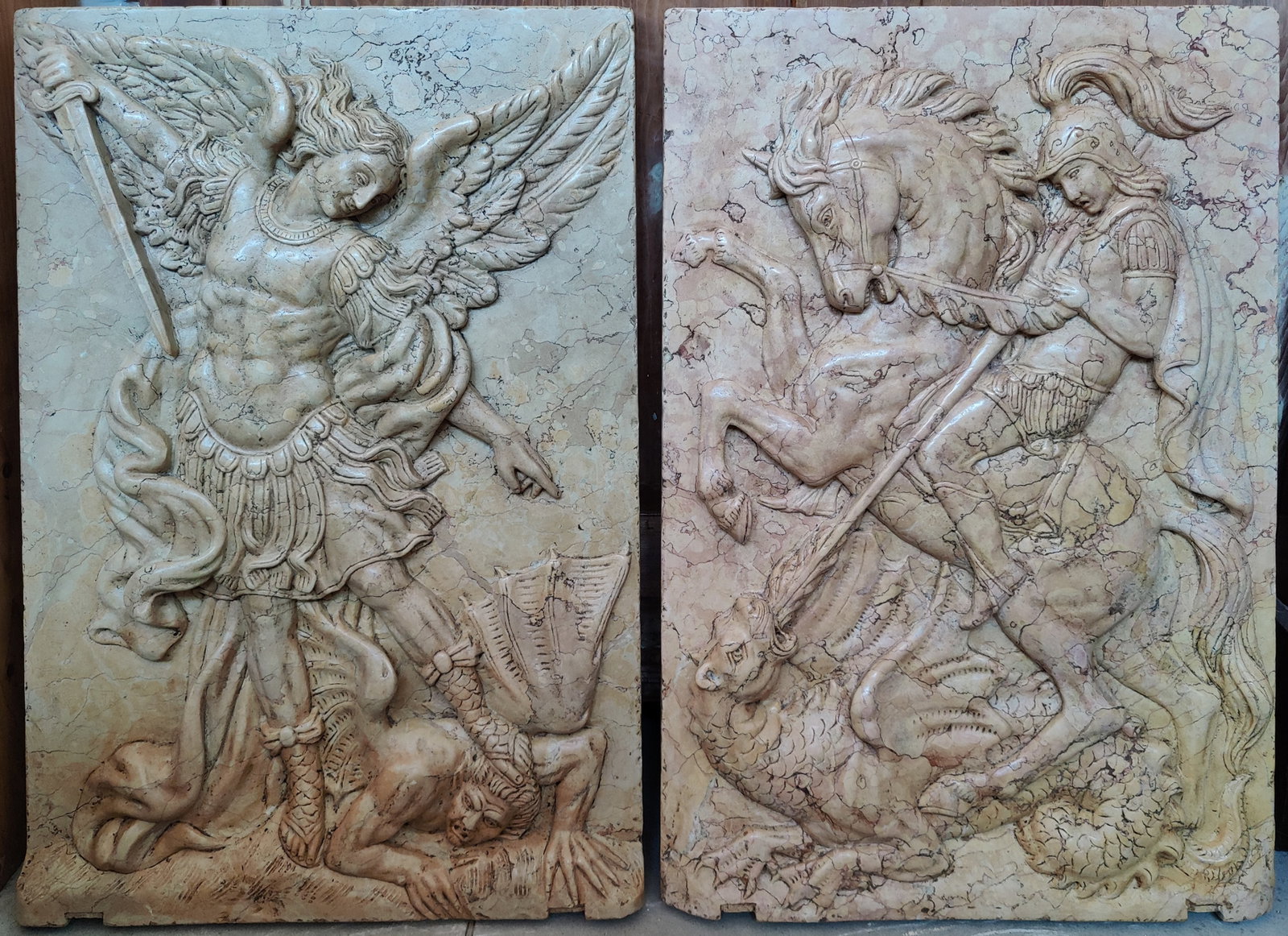 Pair of reliefs depicting Saint Michael and Saint George in Nembro marble, Italy, 19th century: Measurements: 55 x 81 x 4 cm. Carved Nembro marble. Magnificent set of finely carved marble reliefs depicting two iconic scenes from the Christian imagination: Saint Michael the Archangel defeating Lu
