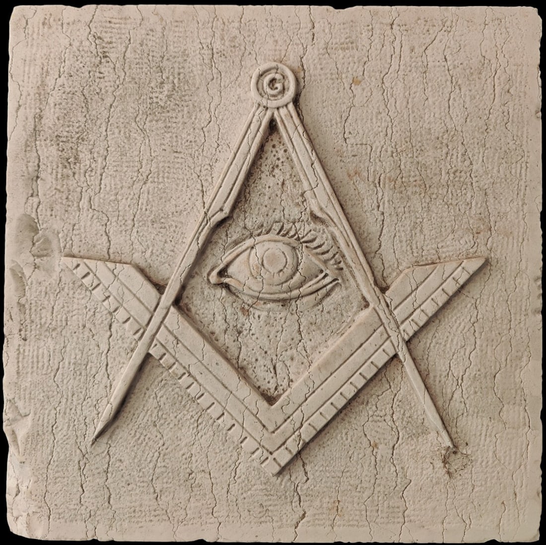 Masonic shield carved in Istrian marble, Italy, 19th century: Marble Masonic shield with a square, compass, and the Eye of Providence, from a private collection in Venice linked to a lodge dating back to 1746. A rare and well-proportioned piece with a prominent 