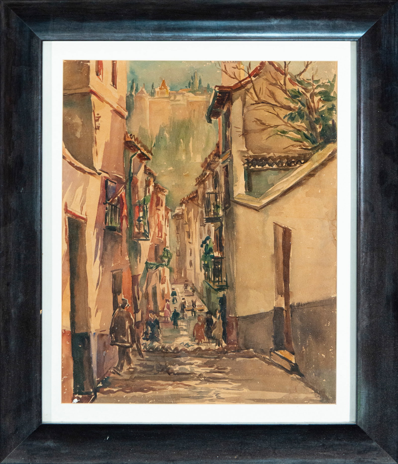Granada Street, Spanish School, 20th Century: Watercolor on paper. Dimensions 58 x 43 / 76 x 63 cm. A street scene in Granada, rendered in a descending perspective, with traditional houses, balconies, and small figures that enliven the transition