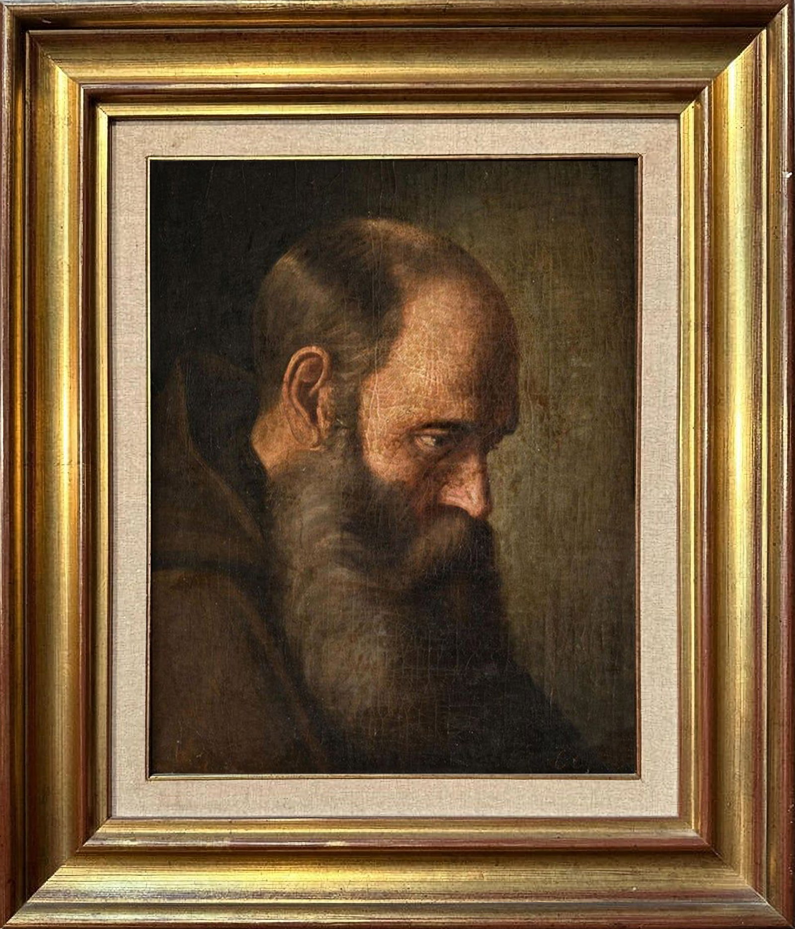 Saint Francis of Paola, Italian School of the 18th century: Oil on canvas. Dimensions: 47 x 37 cm. The work presents a close-up portrait of an elderly male saint, his face intensely focused and his gaze lowered, immersed in an atmosphere of spiritual introspec