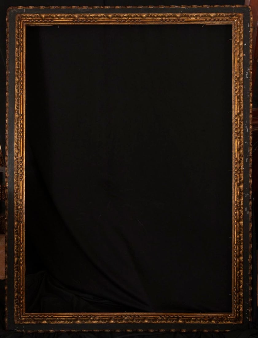 Important Spanish Baroque frame in gilt and ebonized wood, 17th century: Light measurements: 147 x 106 cm. External measurements: 167 x 125 cm
