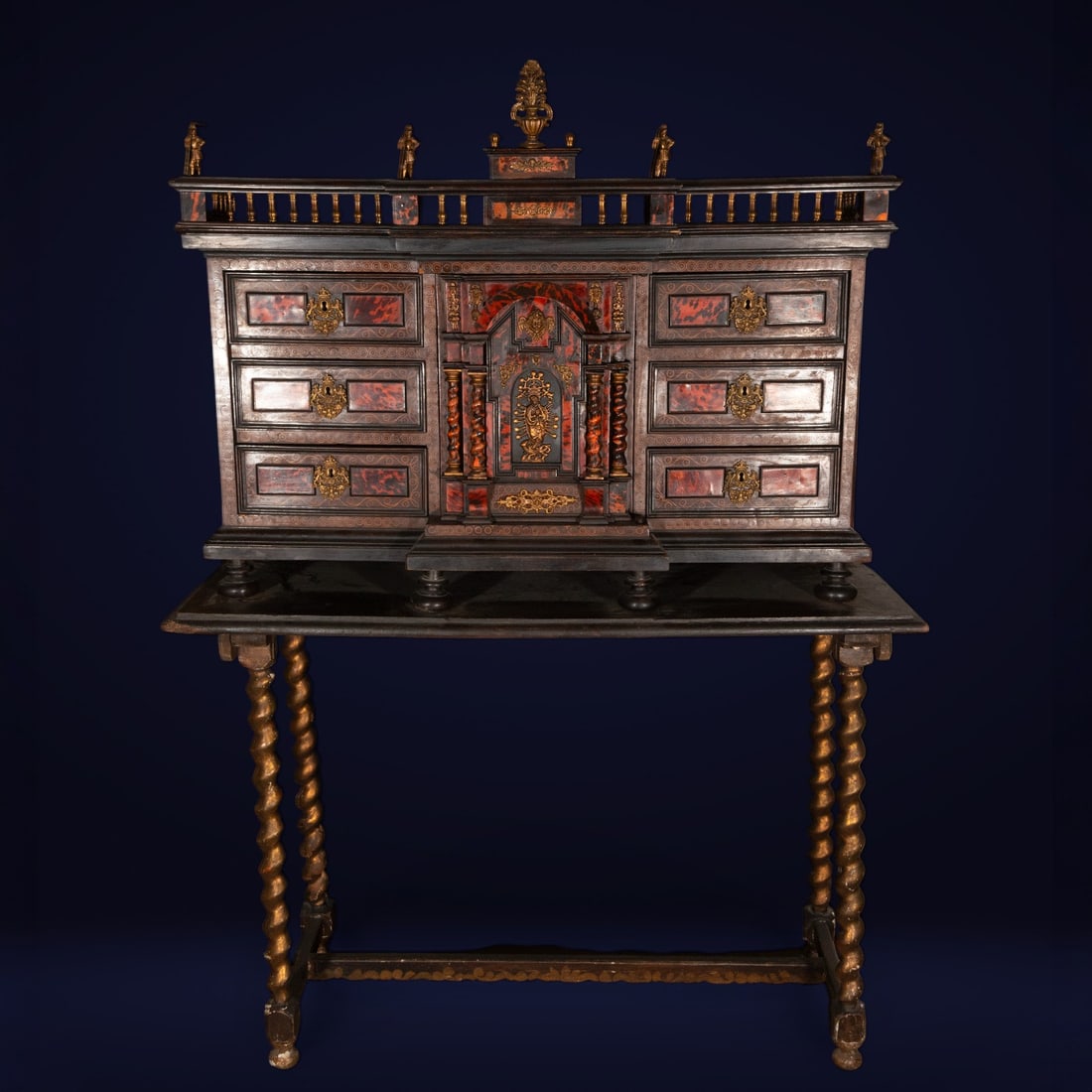 Neapolitan bargueño, Neapolitan school, 18th century: Ebonized wood, simulated tortoiseshell or marbled plates, and bronze. Dimensions: Head 90 x 120 x 35 cm; Total: 182 x 133 x 41 cm. A bargueño (a type of cabinet) of extraordinary ornamental richness,