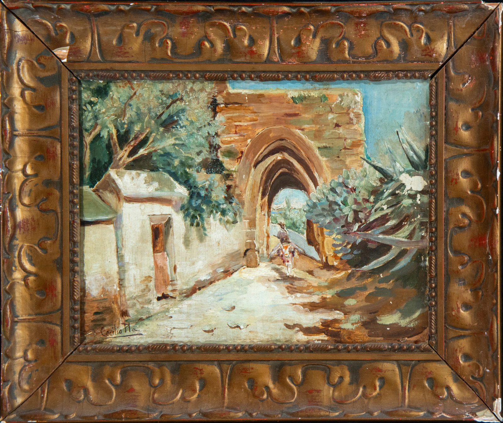 Landscape with a Figure on Horseback. Spanish Luminist School. 20th century.: Oil on cardboard. Composition framed by reddish stone architecture on the right and a white wall on the left, which draw the eye toward a figure on horseback beneath an arch. The scene is bathed in wa