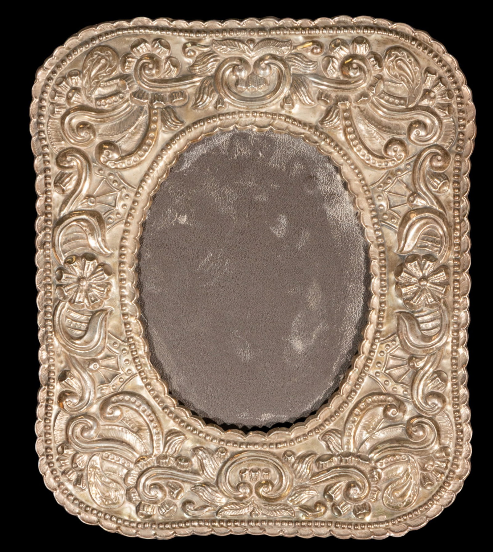 Embossed silver peruvian picture frame. European School. 19th century. (1 of 4)