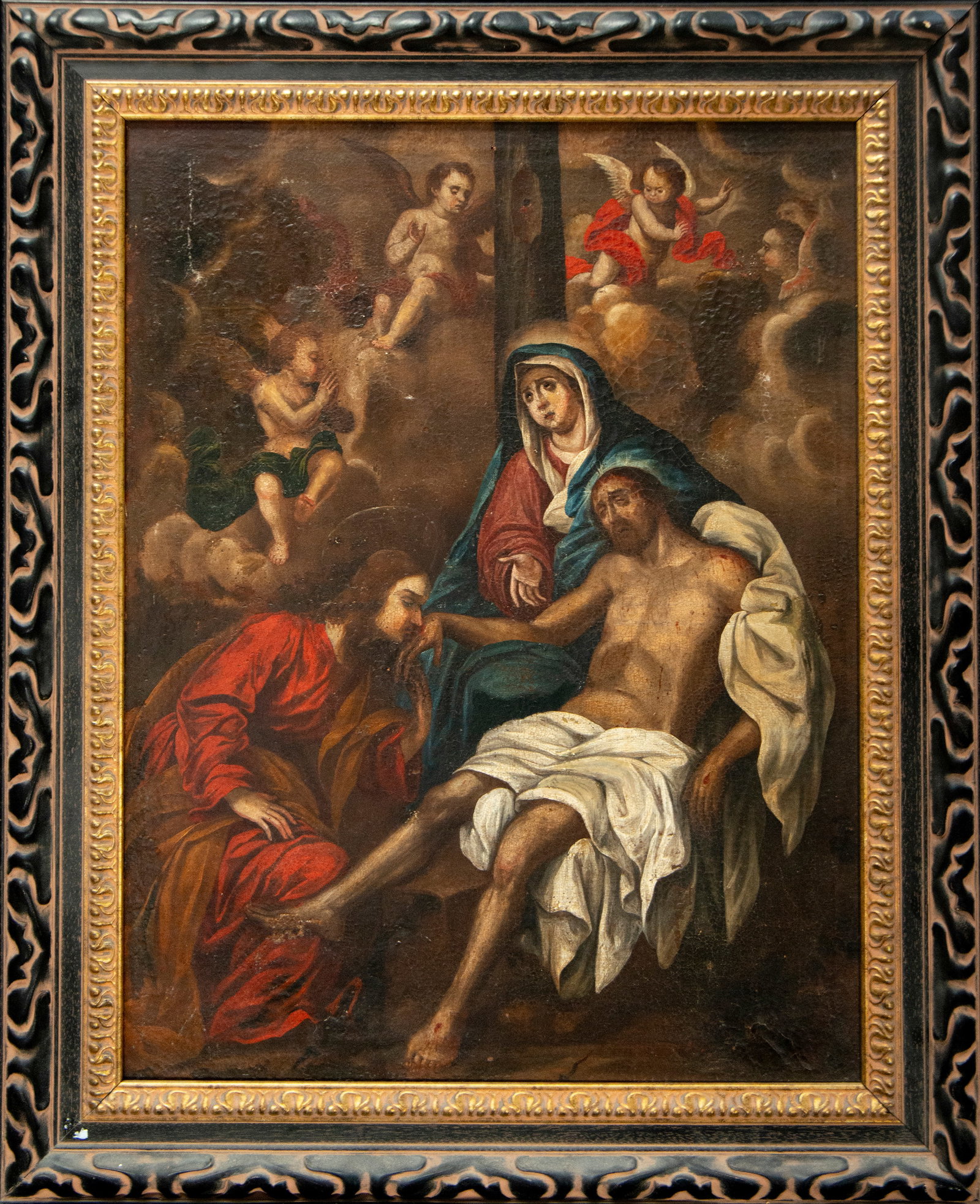 Descent from the Cross. Colonial School, New Granada. New Spanish Baroque. 17th Century.: Oil on canvas. A deeply emotional composition presents a religious scene with the dead Christ supported by the Virgin Mary and Saint John, while several angels look down with mournful expressions from
