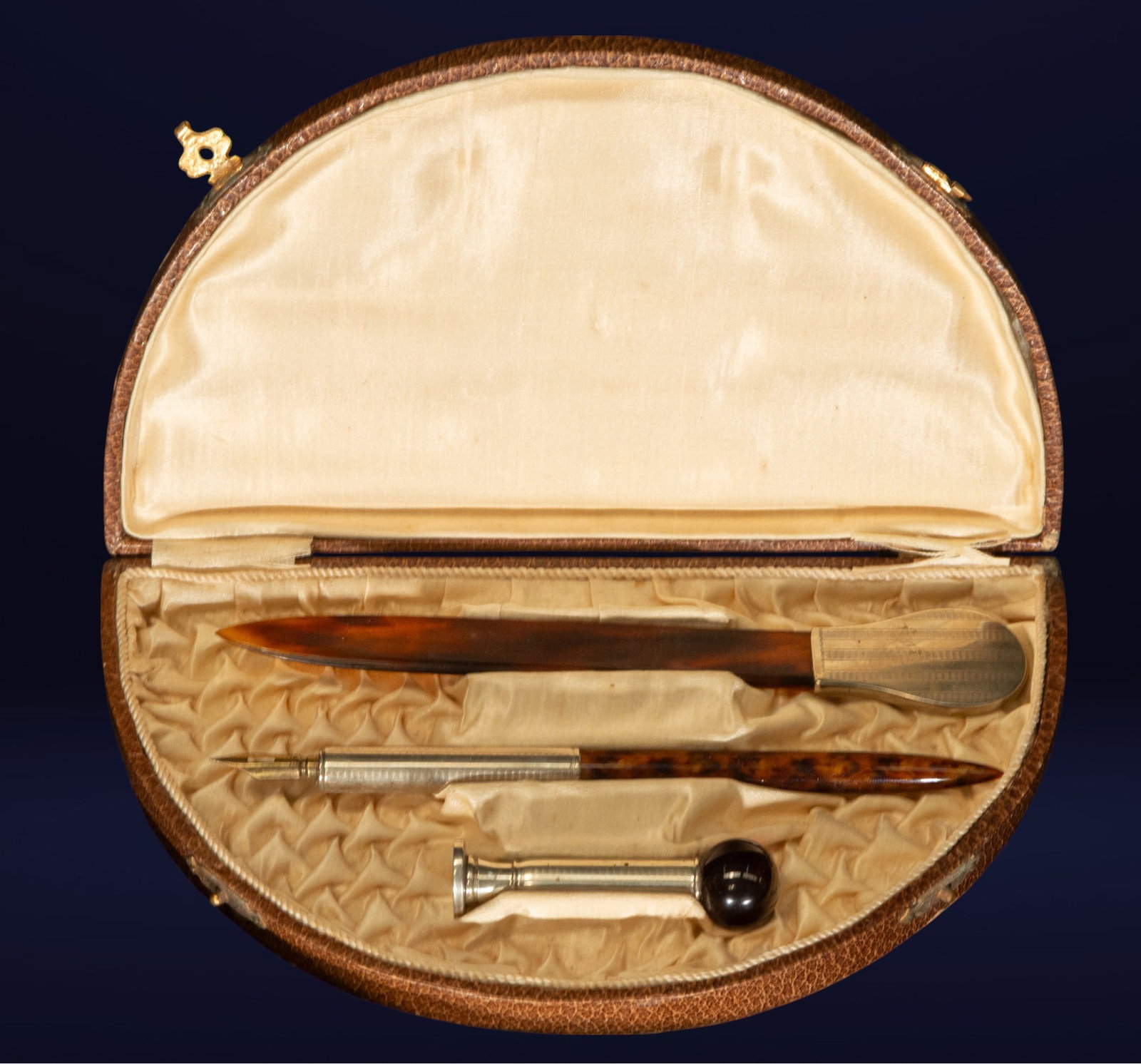 Writing set with quill pen and letter opener. European School. 19th century: Silver, tortoiseshell, and steel. The set consists of a pen nib with a turned tortoiseshell handle, a letter opener with a silver handle embossed with geometric and vegetal decoration, and a stamp era