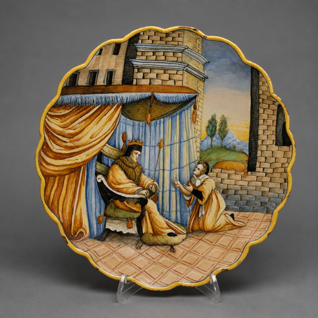 Crespina de Casteldurante, Italy, 16th century: Glazed and polychrome ceramic. Measures 27 cm in diameter. An important Italian crespina made in Casteldurante during the 16th century, decorated on the obverse with a refined courtly scene of biblica