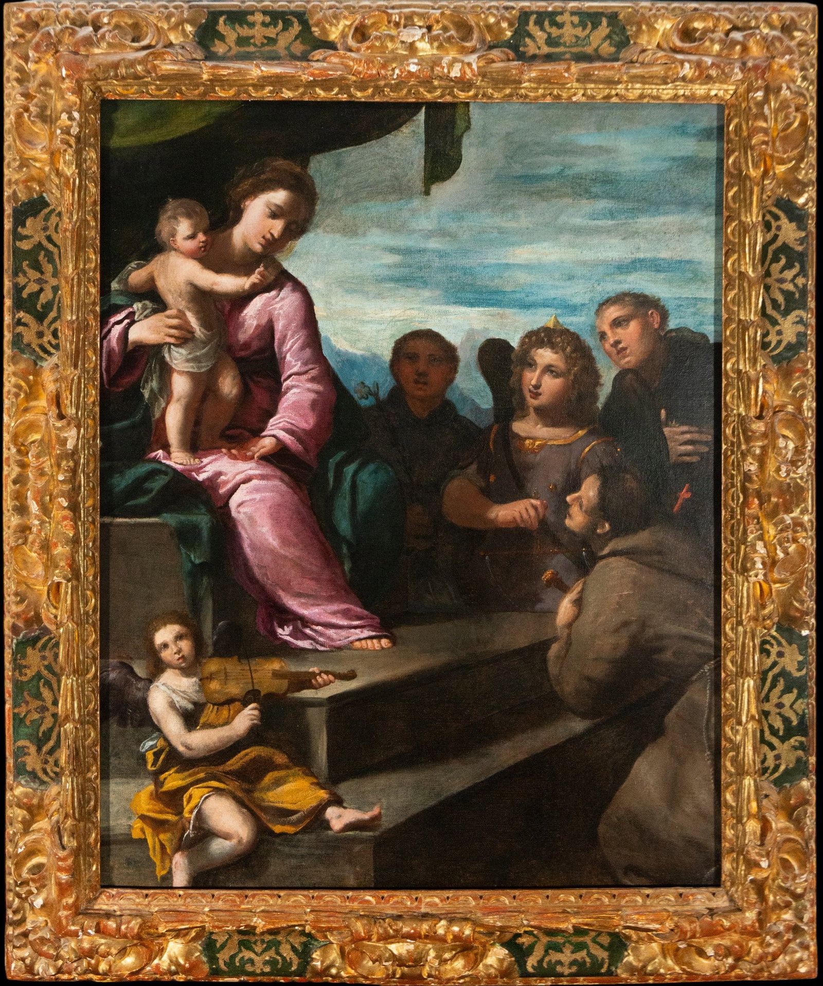 Virgin and Child with Saints, Italian School, circle of Ippolito Scarsella, 17th Century: Oil on canvas. Dimensions 101 x 79 cm; 124 x 104 cm with frame. A devotional composition of refined Mannerist sensibility depicting the Virgin enthroned, holding the Christ Child, while several sacred