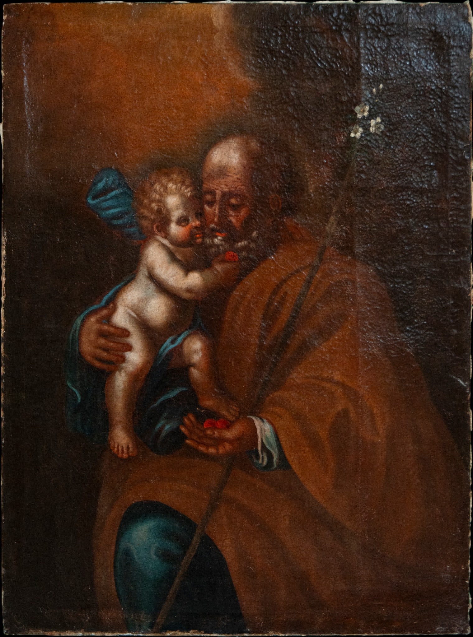 Saint Joseph with the Child, Granada School, 18th Century: Oil on canvas. Dimensions: 102 x 80 cm. A devotional composition of intense emotional intimacy in which Saint Joseph holds the Christ Child in a protective and contemplative pose. The figure of the sa
