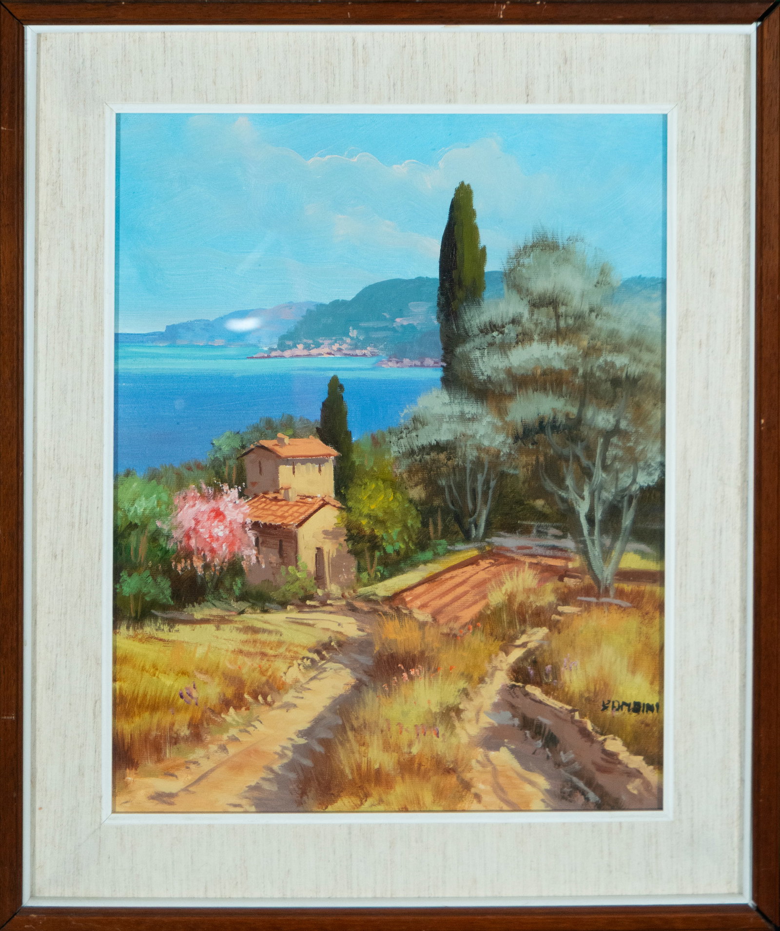 Signed lake landscape, contemporary school, 21st century: Oil on canvas. Dimensions: 49 x 37 cm; 65 x 55 cm. Luminous landscape with a view of a lake, houses, cypress trees, and Mediterranean vegetation. The brushwork is loose and decorative, with vibrant co
