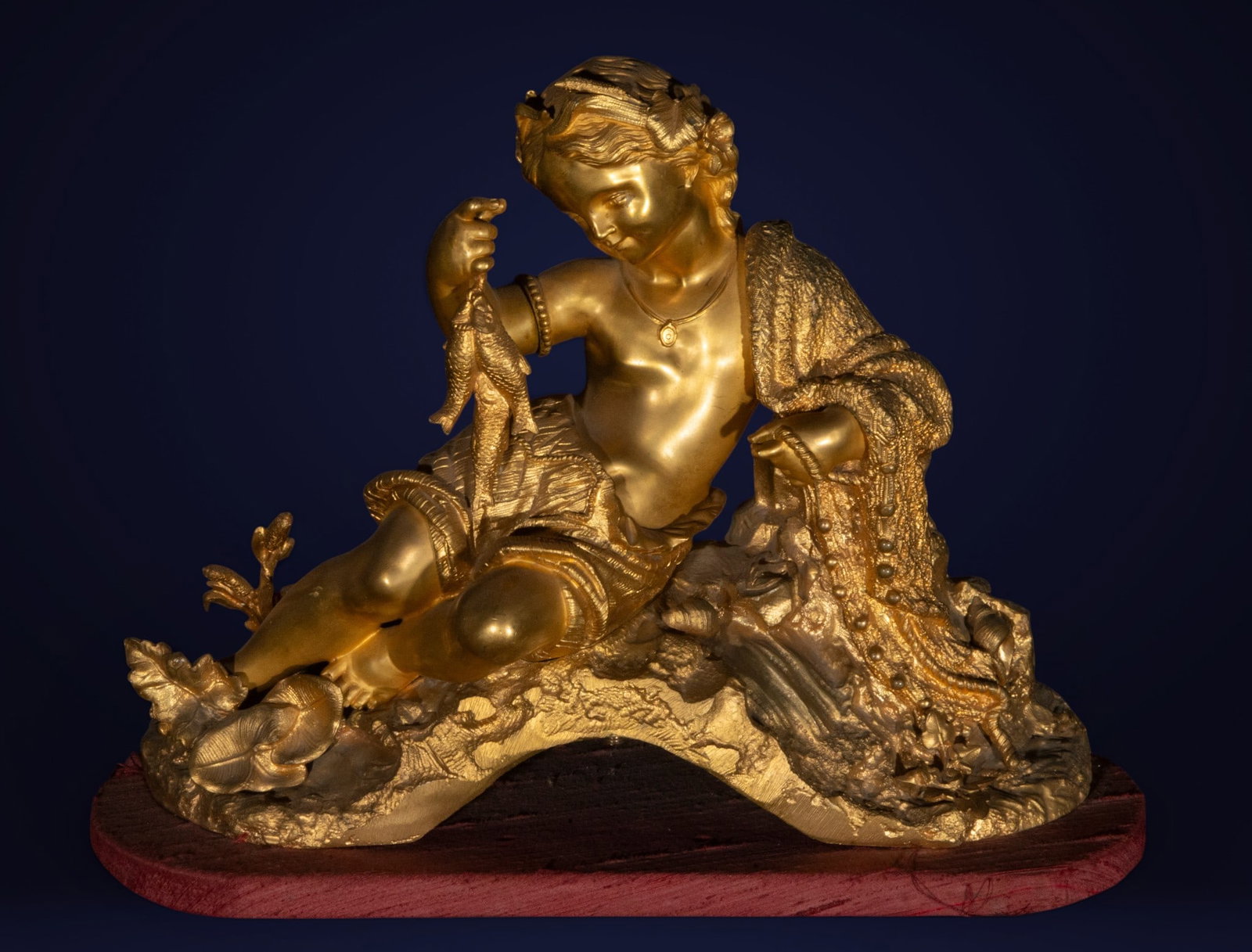 Mercury-gilt bronze figure, French School, 19th century: Mercury-gilt bronze. An important decorative writing set of classical inspiration, featuring a reclining female figure holding fish, accompanied by rich ornamental elements with marine and plant motif