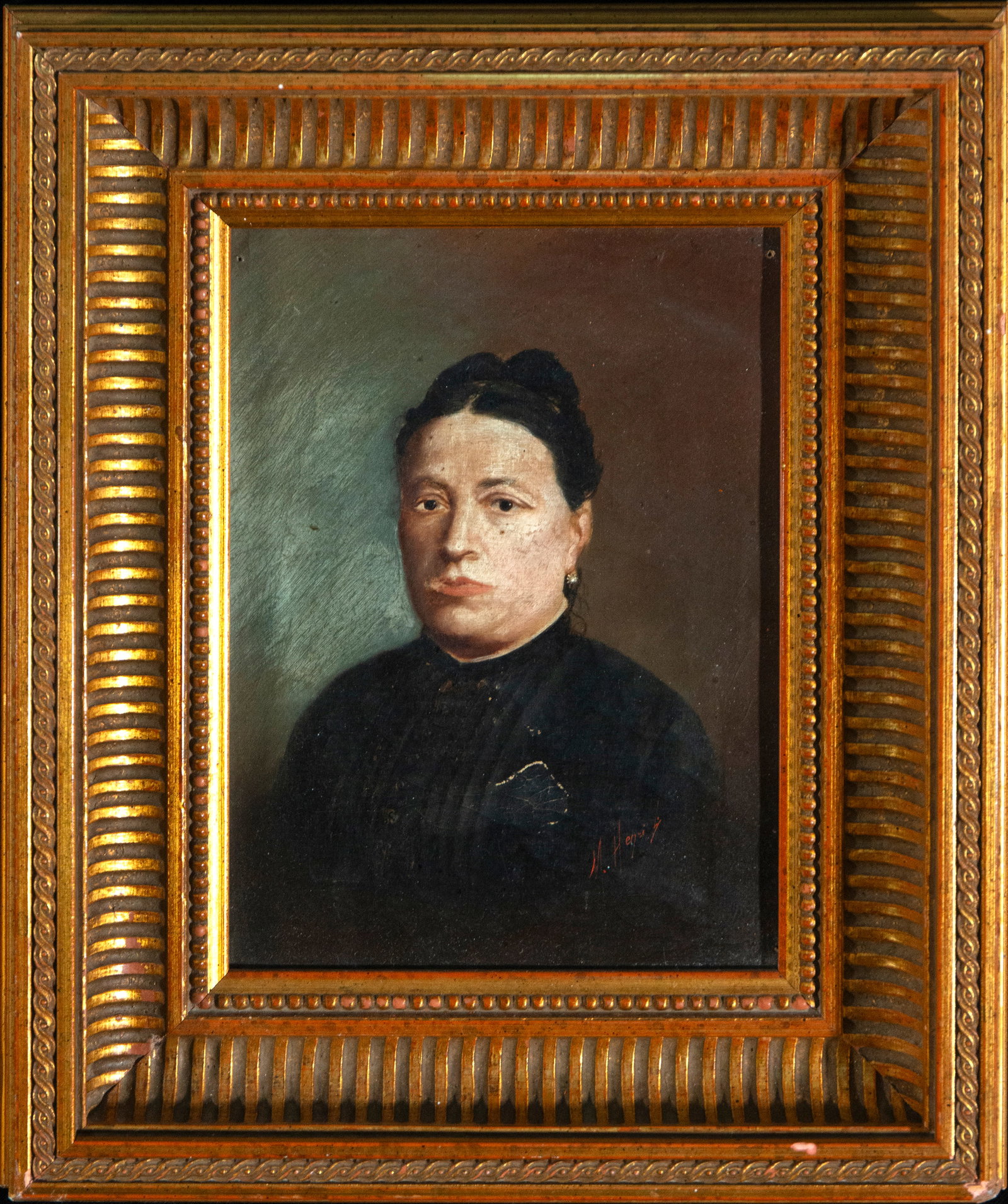 Portrait of a lady, Signed, Spanish School, 19th Century: Oil on canvas. Dimensions: 22 x 17 cm; framed 32 x 17 cm. Bust portrait of a woman, frontally positioned against a neutral, dark background. She wears austere black clothing and small earrings. The fa